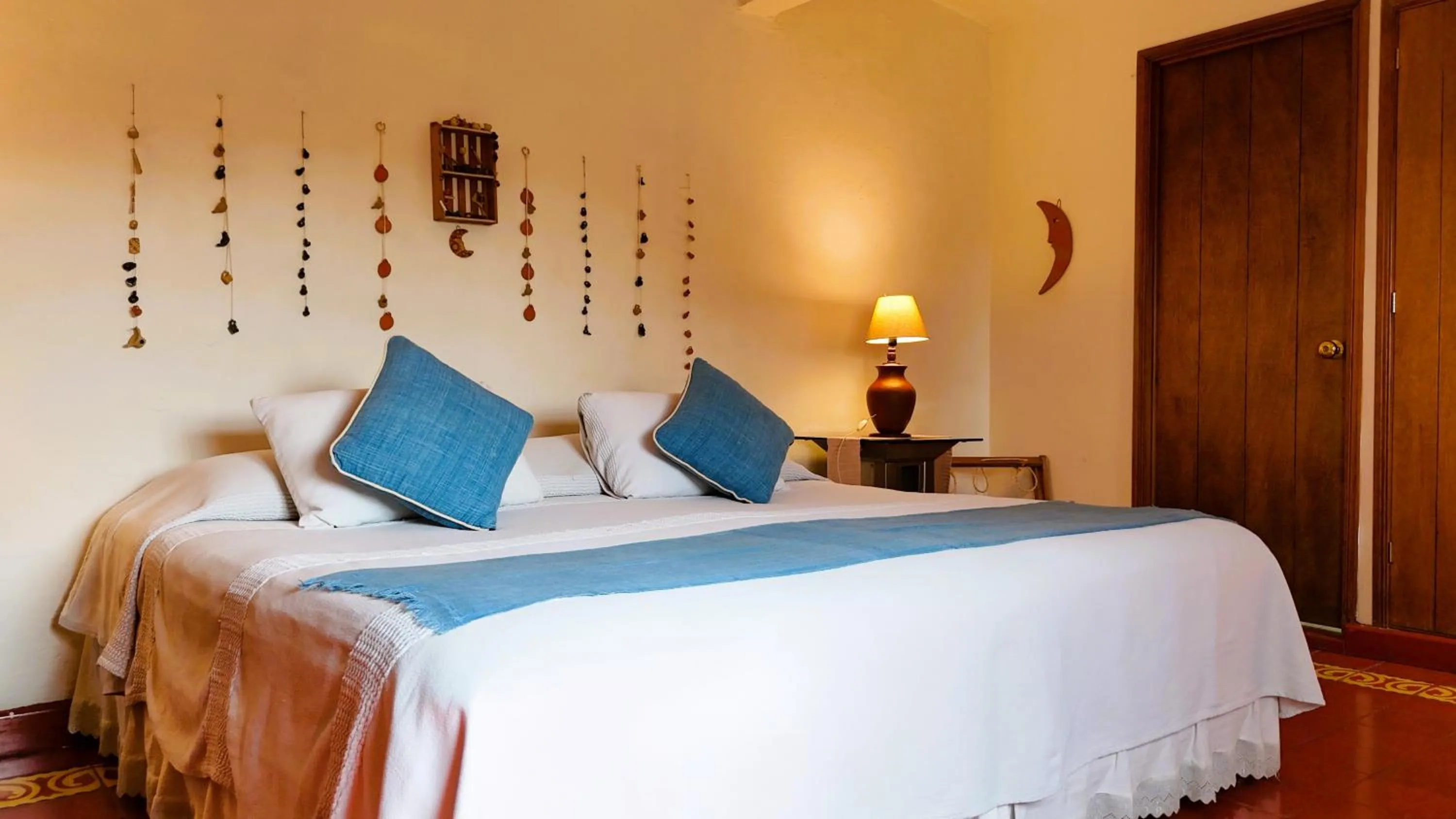 Bed in El Diablo y la Sandia B&B