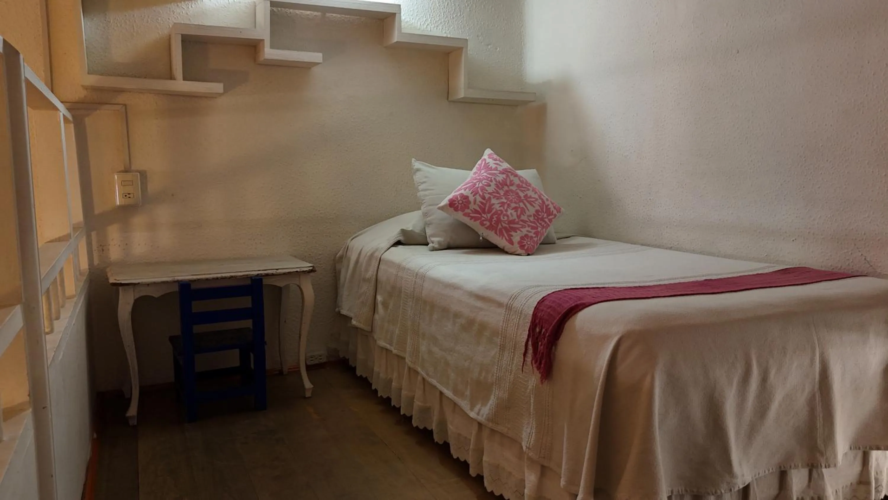 Bed in El Diablo y la Sandia B&B