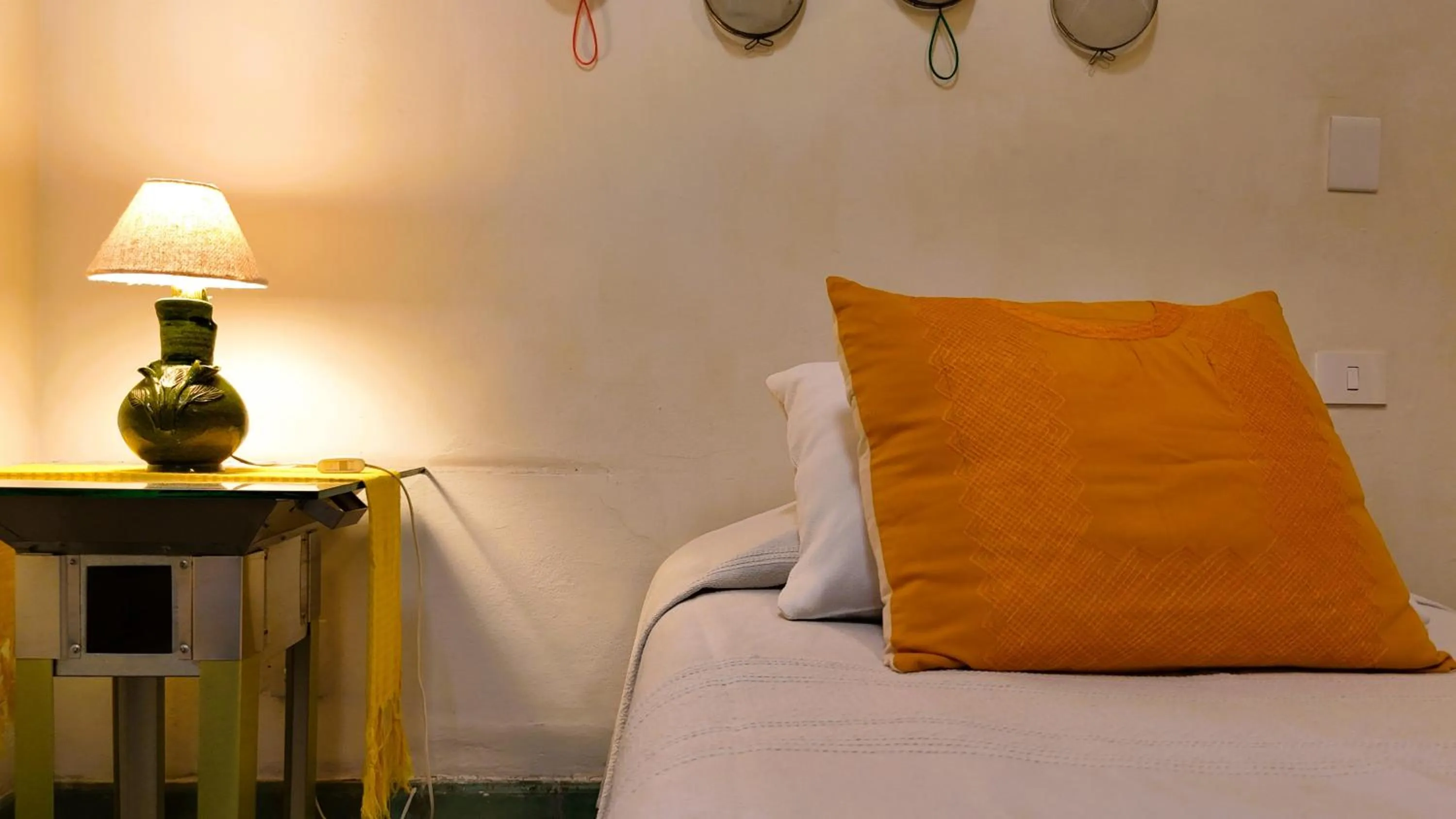 Bed in El Diablo y la Sandia B&B