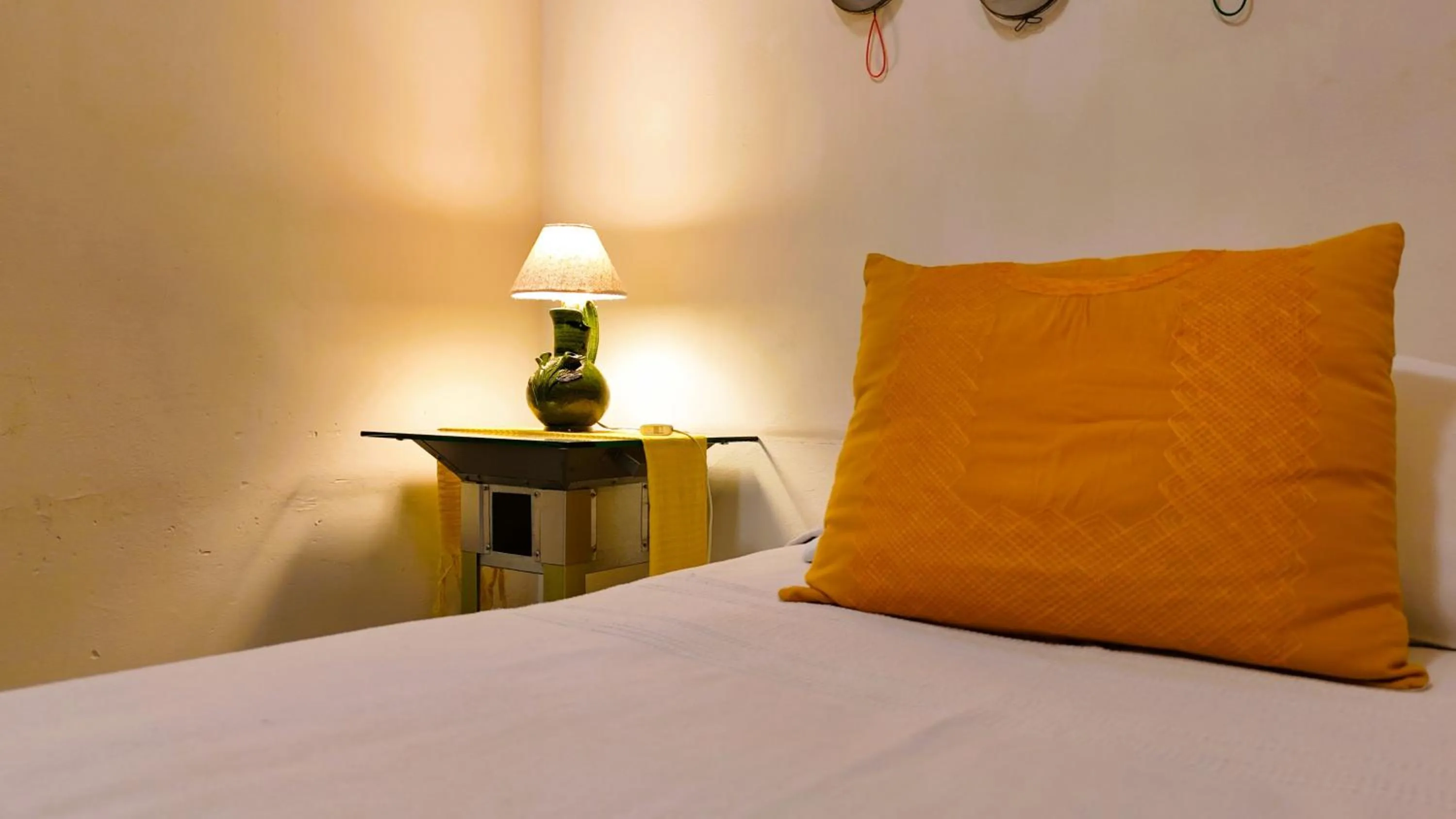 Bed in El Diablo y la Sandia B&B