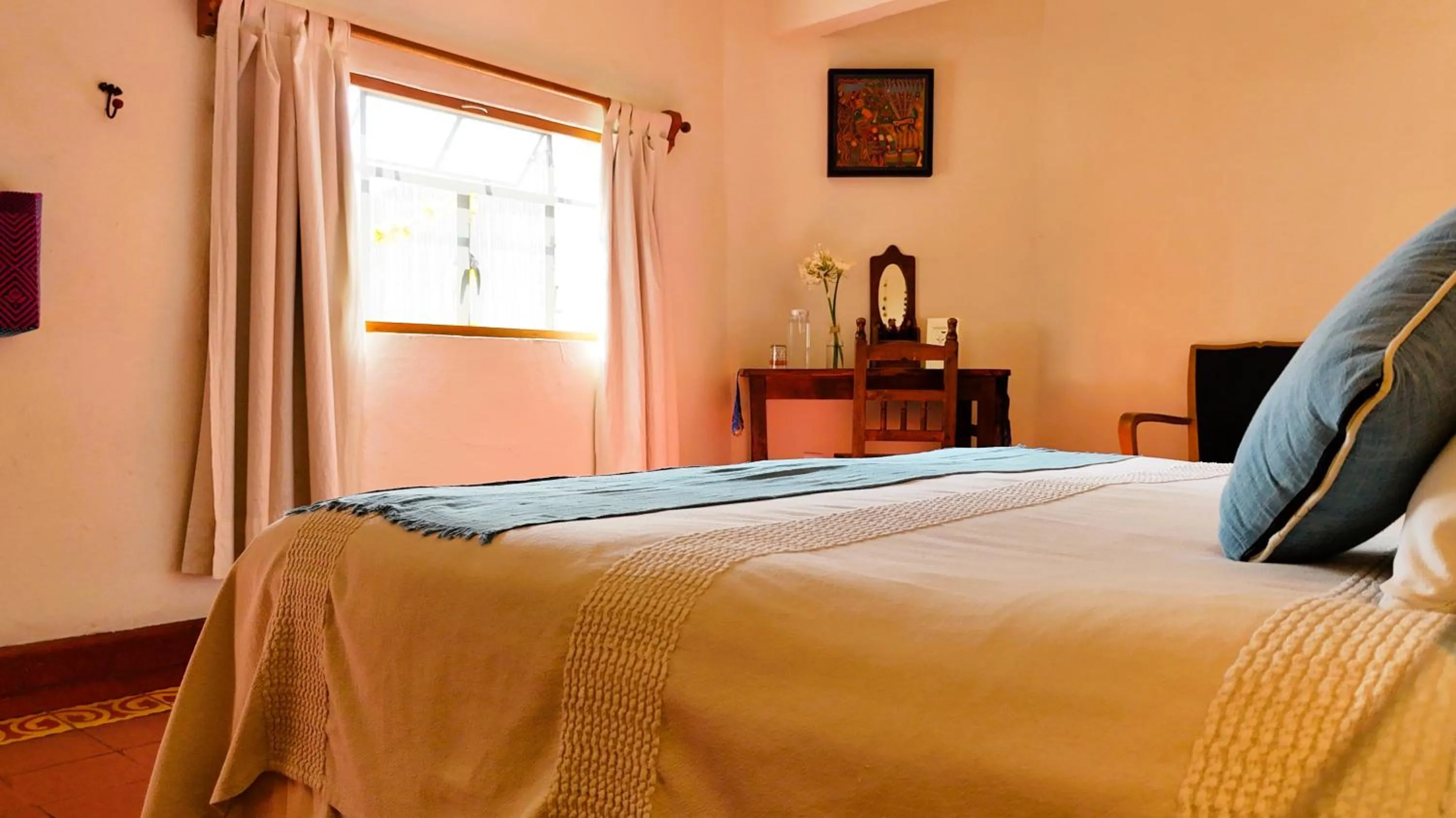 Bed in El Diablo y la Sandia B&B