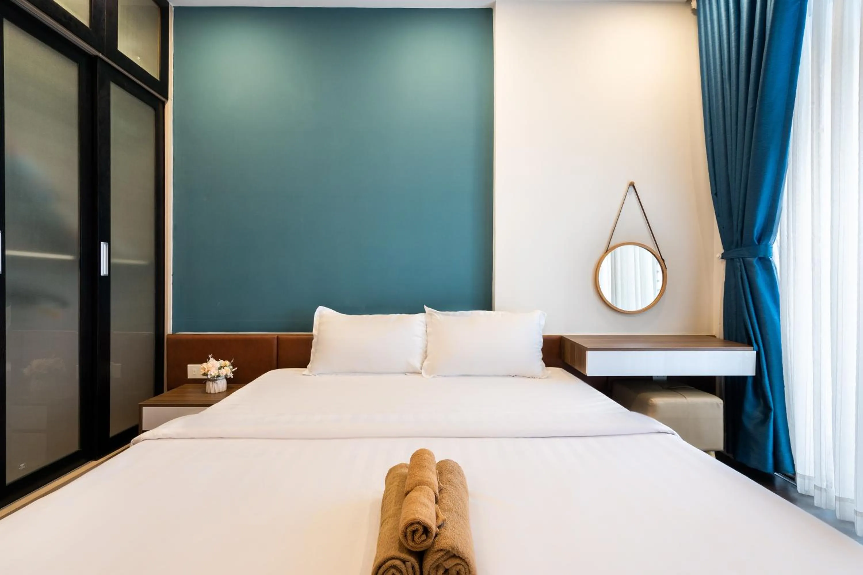 Bed in TeeUp Home - Infinity Pool Signature