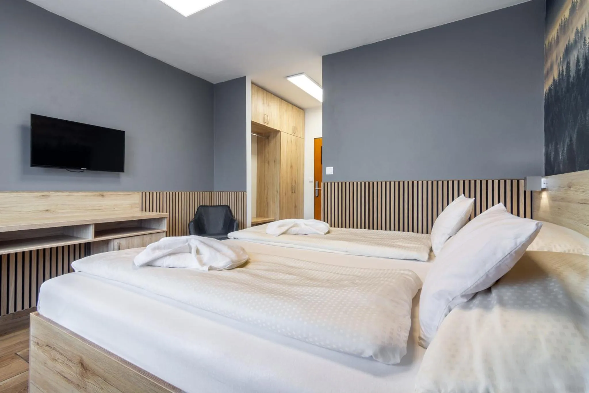 Communal lounge/ TV room, Bed in Hotel U Kociana