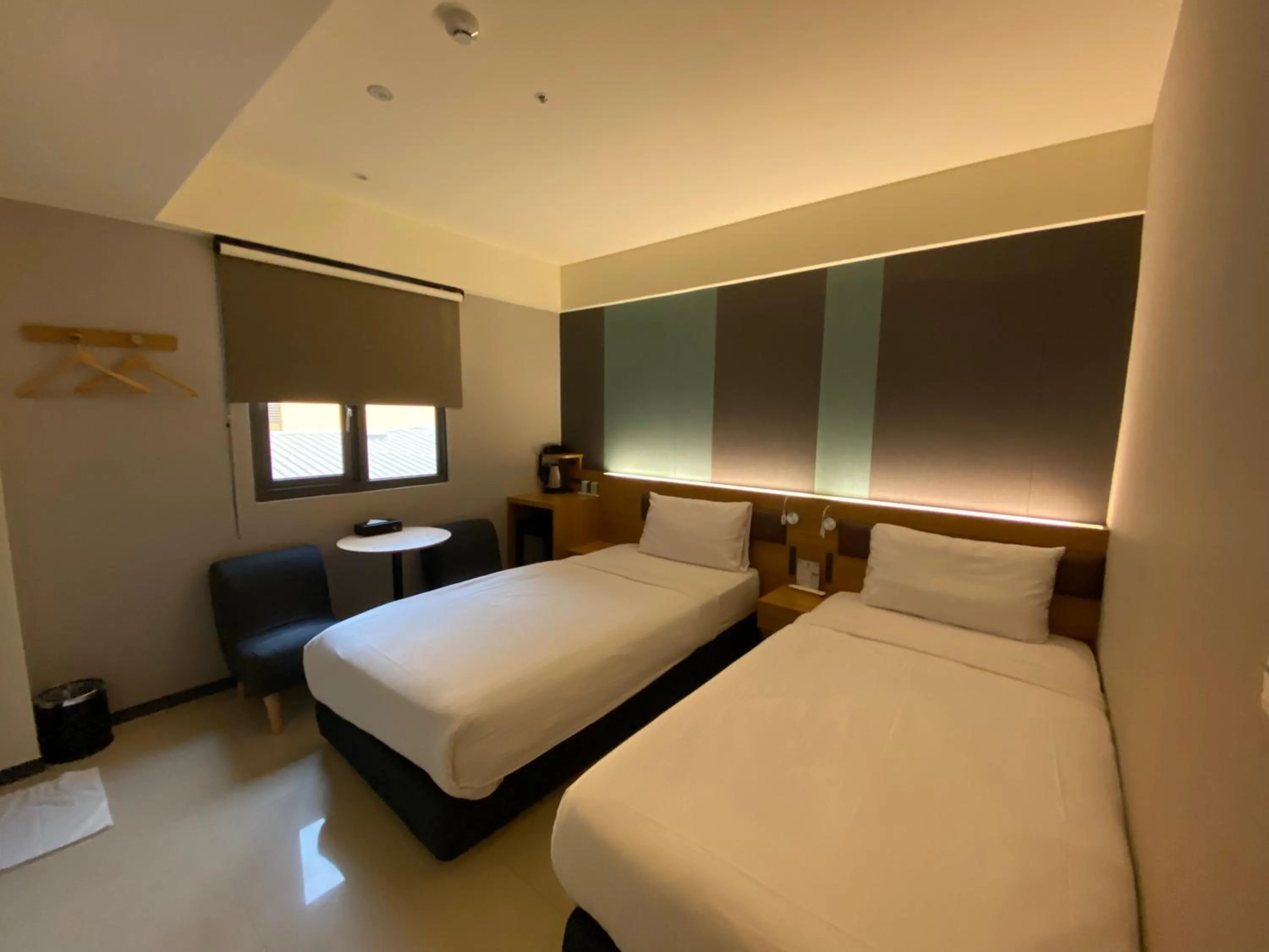 Photo of the whole room, Bed in Fu Kuang Hotel
