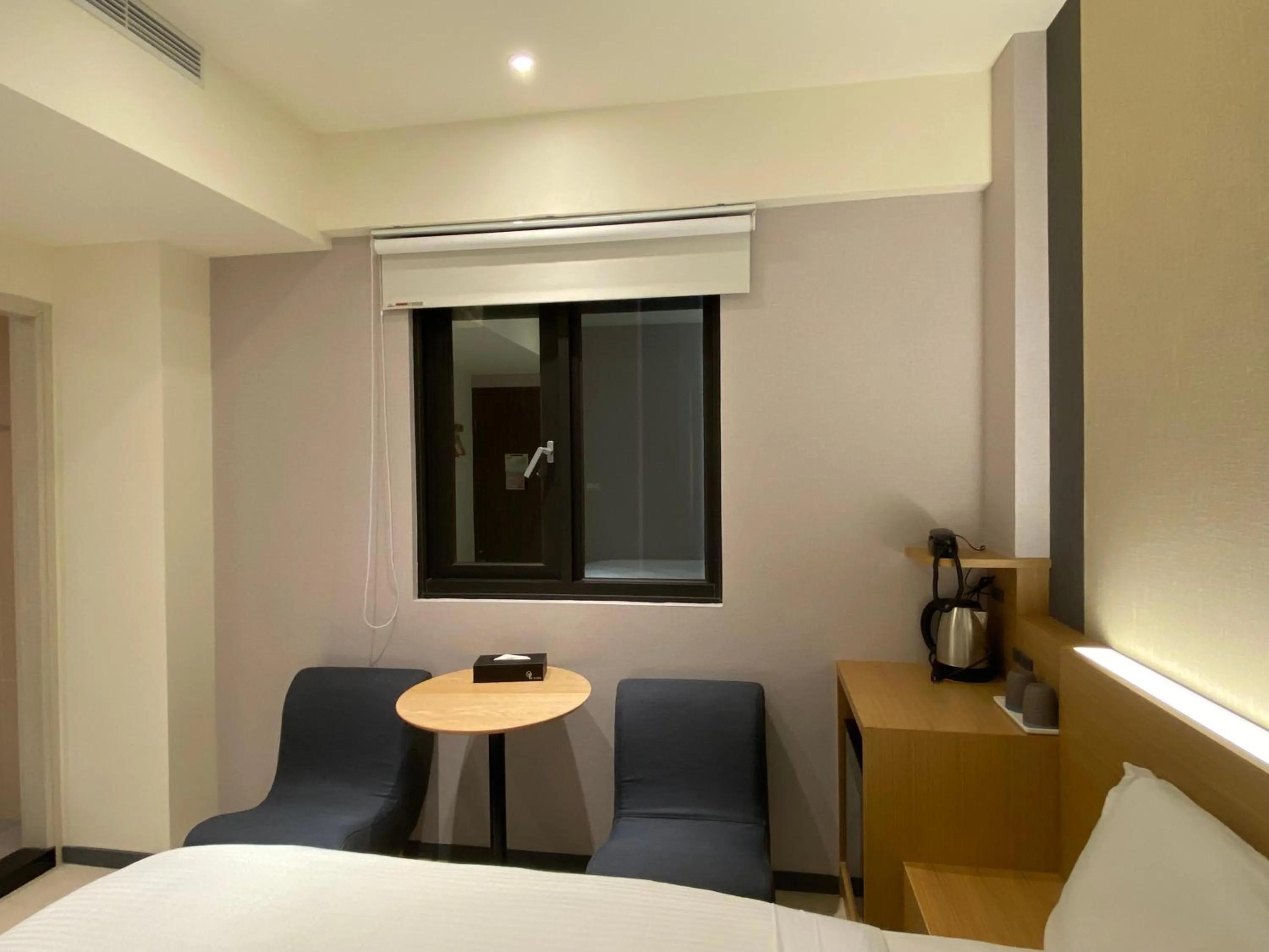 Seating area, Bed in Fu Kuang Hotel