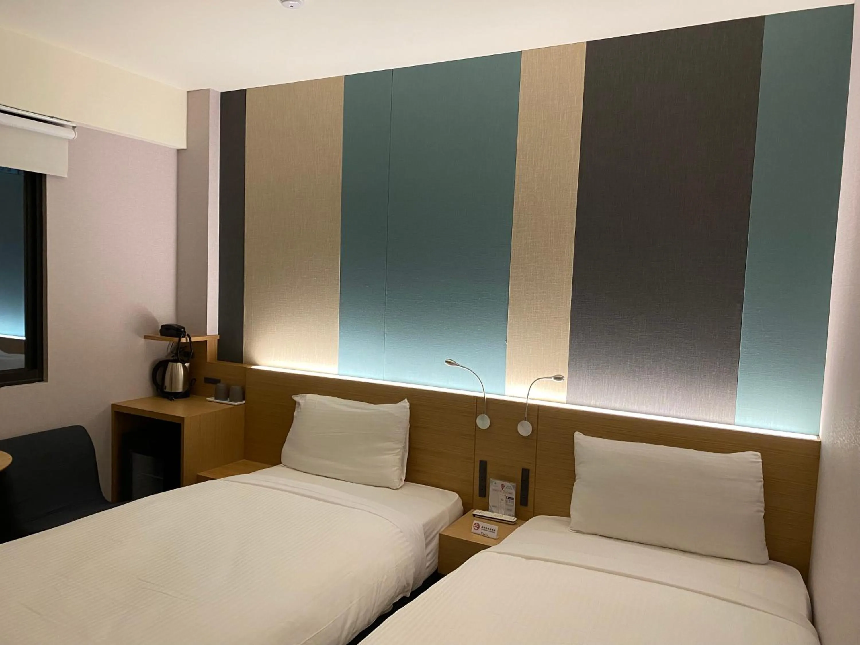 Bed in Fu Kuang Hotel