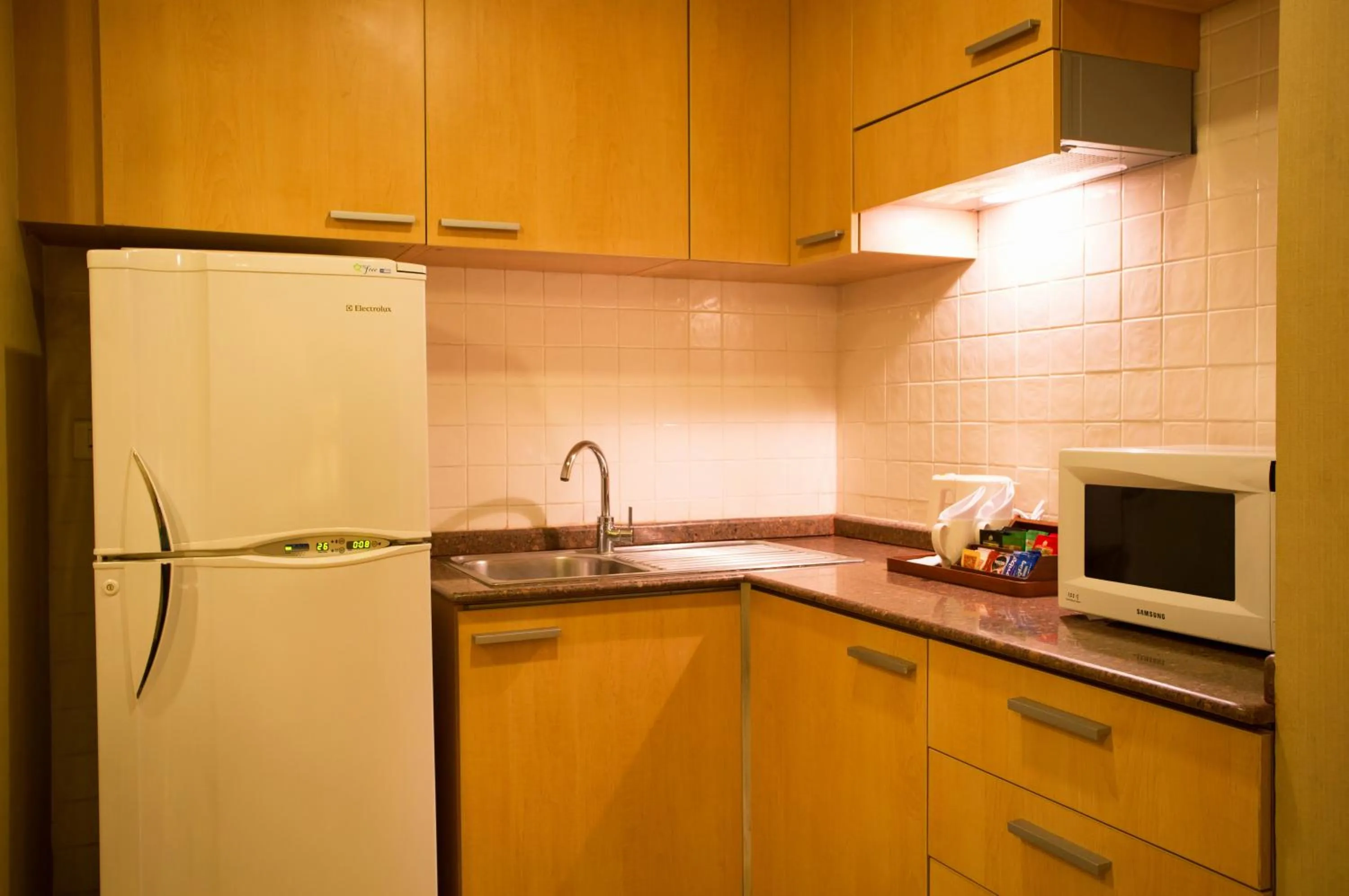 Kitchen or kitchenette in Ellaa Hotel Gachibowli