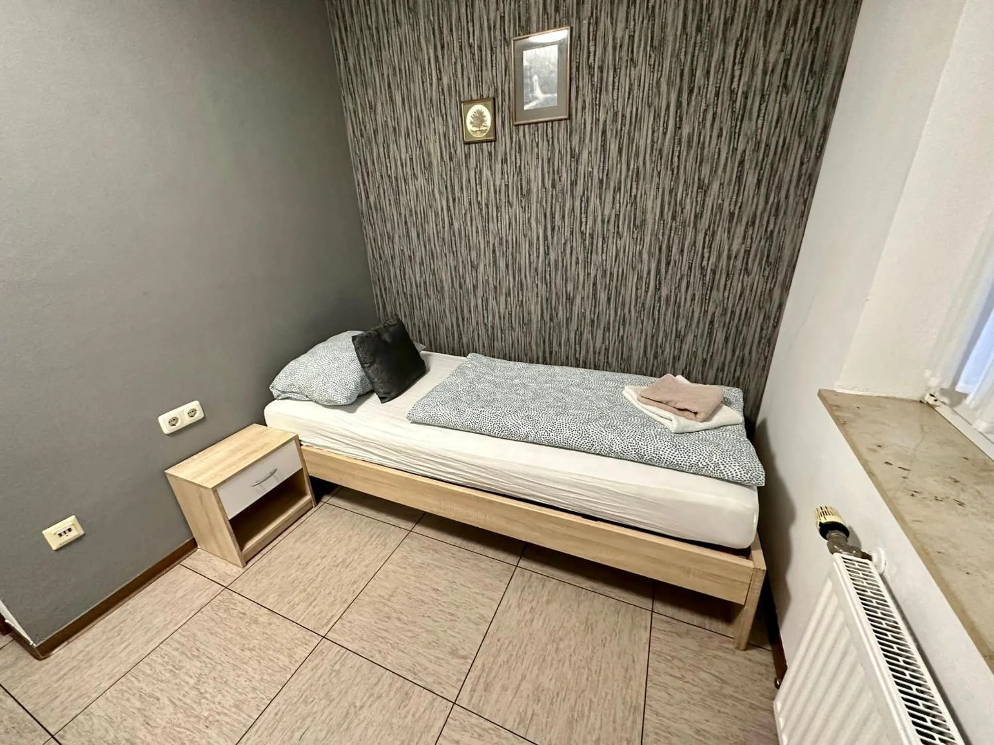 Bed in Hotel Landhaus Köln