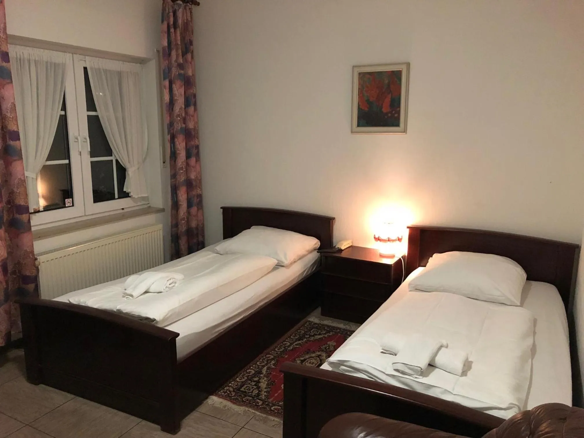 Bed in Hotel Landhaus Köln