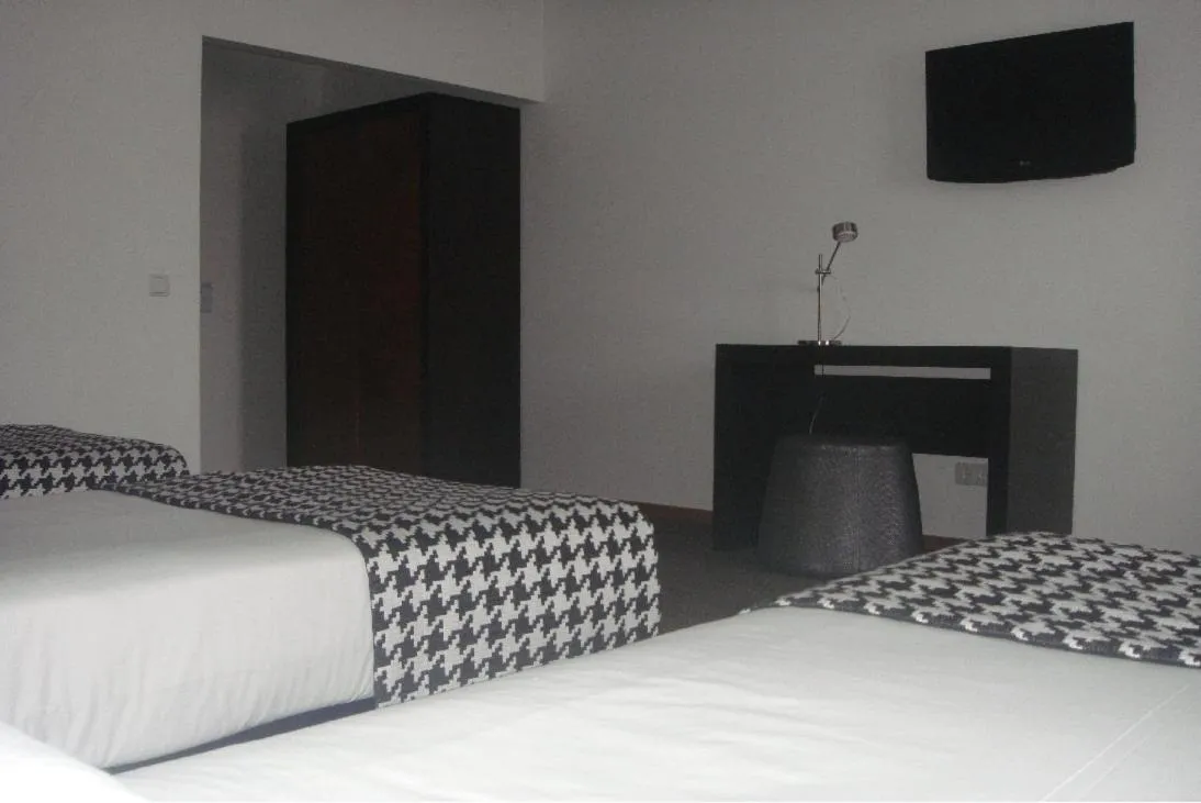 Photo of the whole room, Bed in Paredes Design Hotel