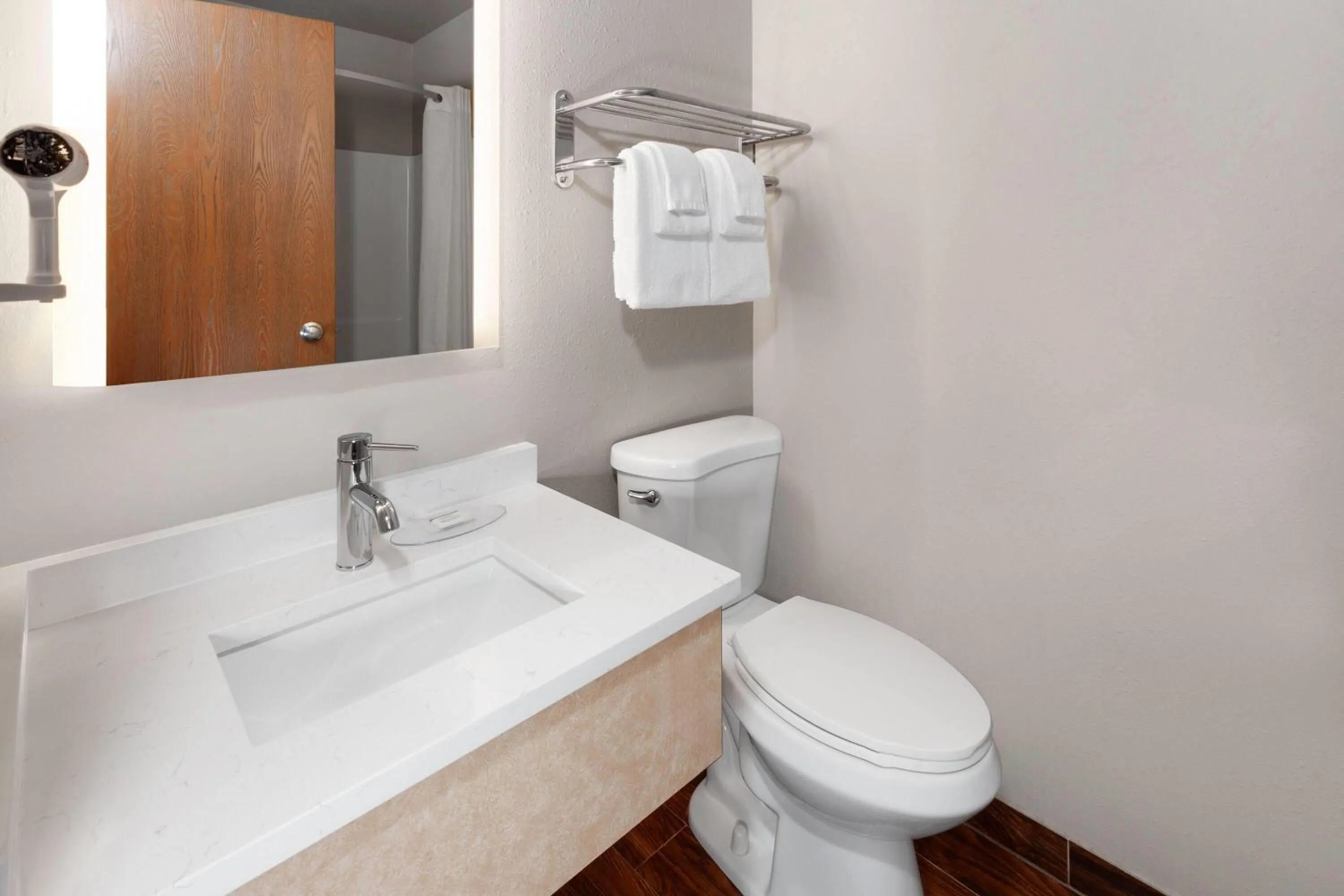 Bathroom in Super 8 by Wyndham Green Bay Near Stadium