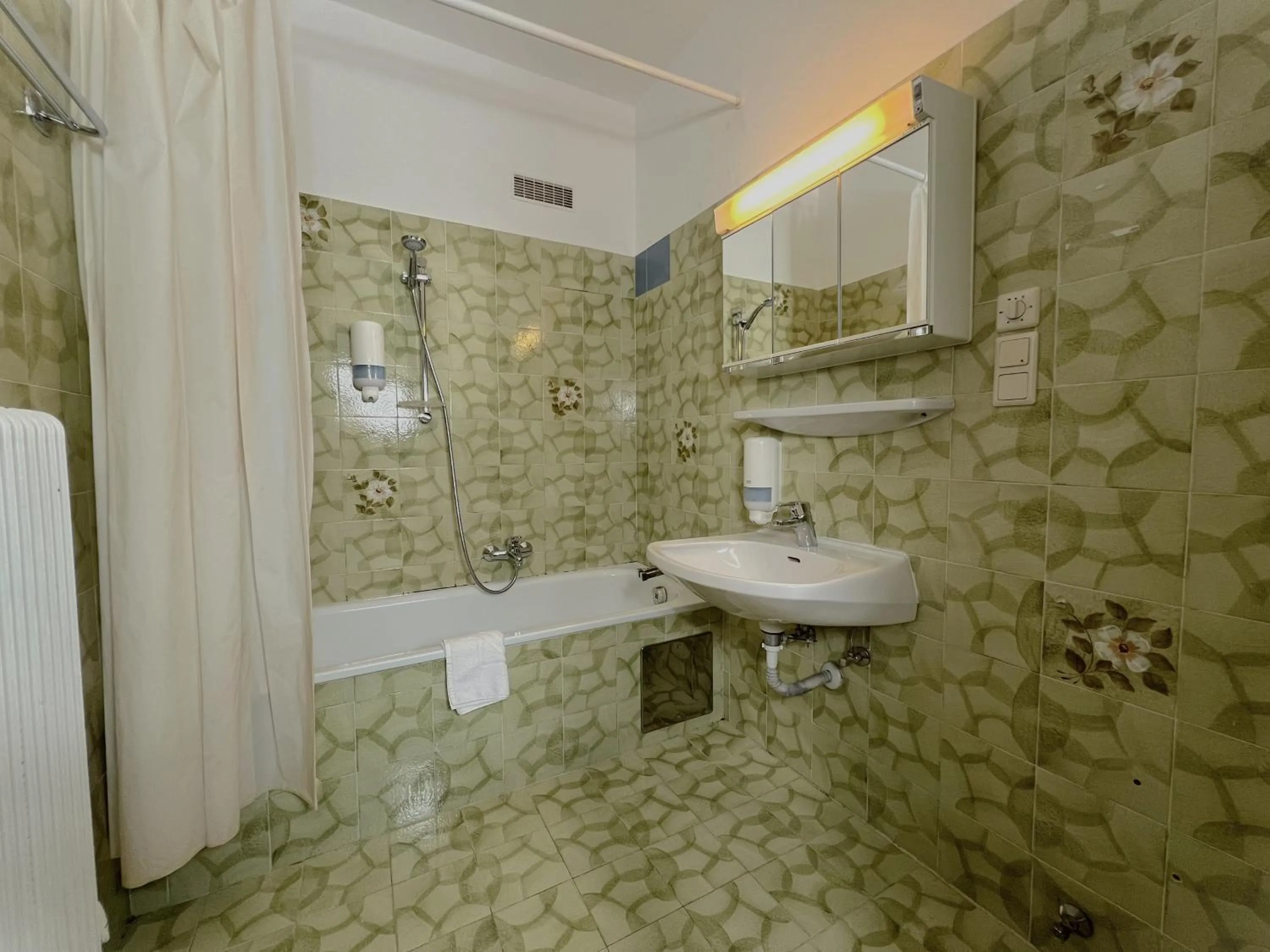 Bathroom in Mountain Hotel & Hostel