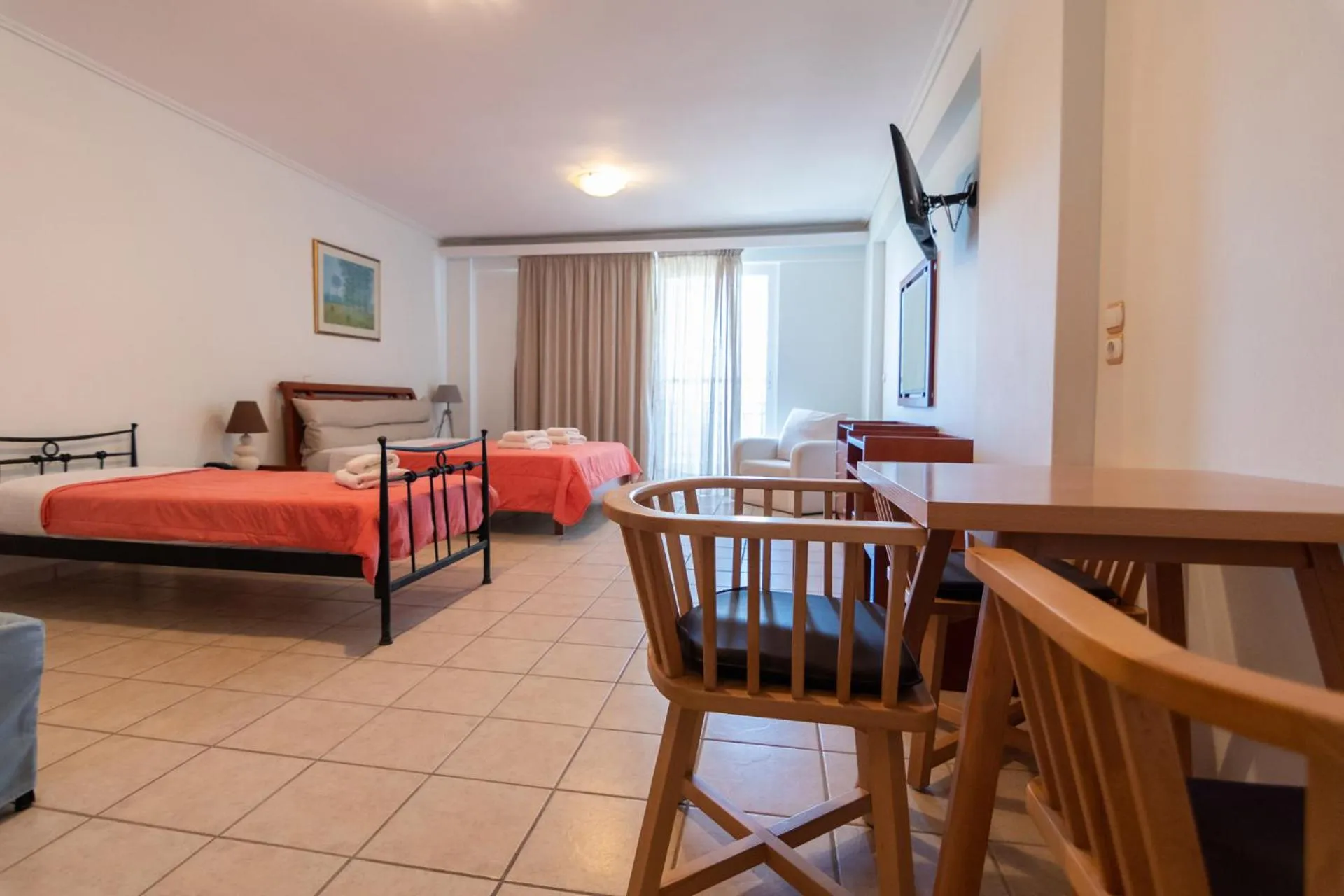 Bed in Hotel Grand Nefeli