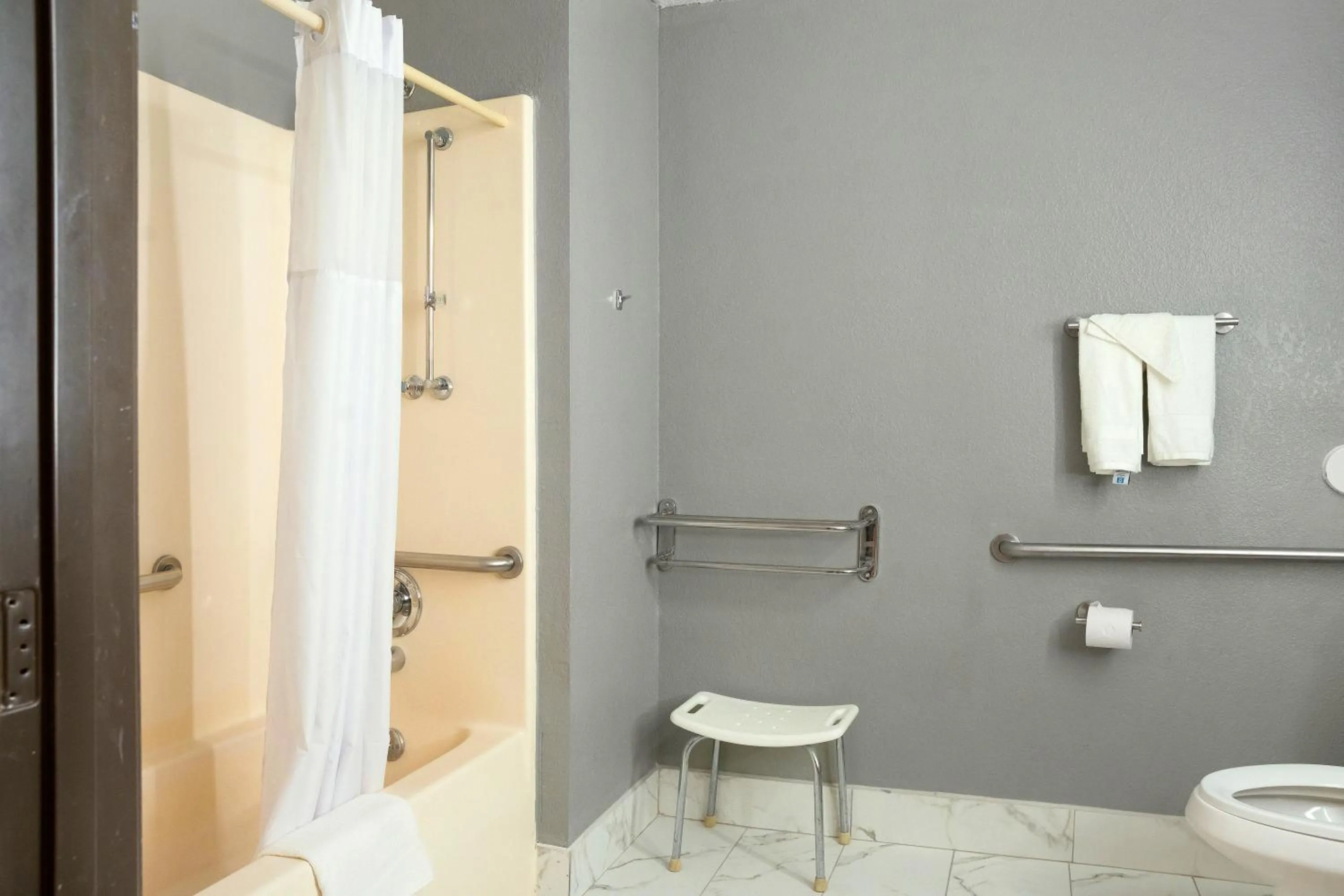 Bathroom in Days Inn by Wyndham Omaha - West Dodge