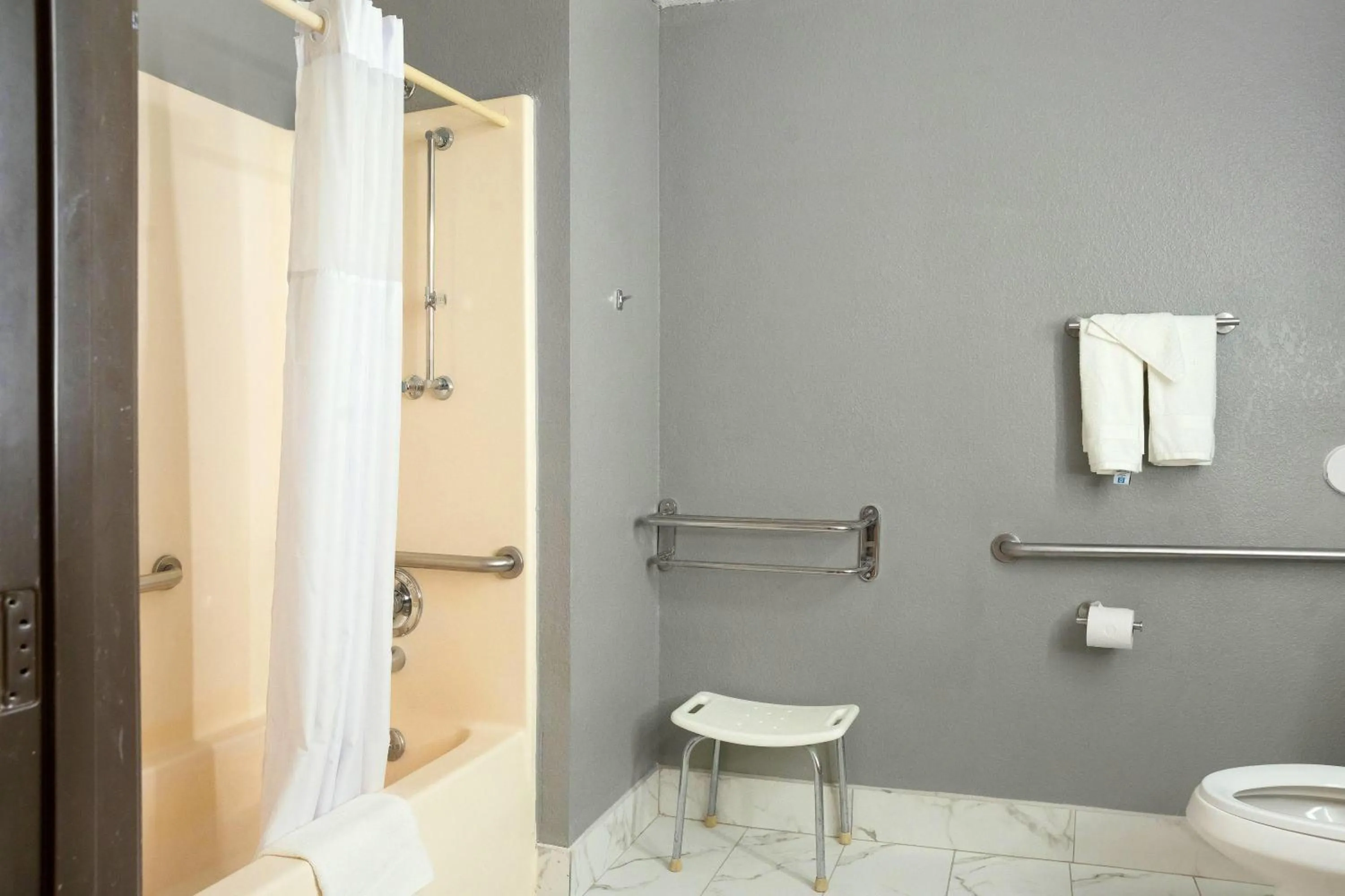 Bathroom in Days Inn by Wyndham Omaha - West Dodge