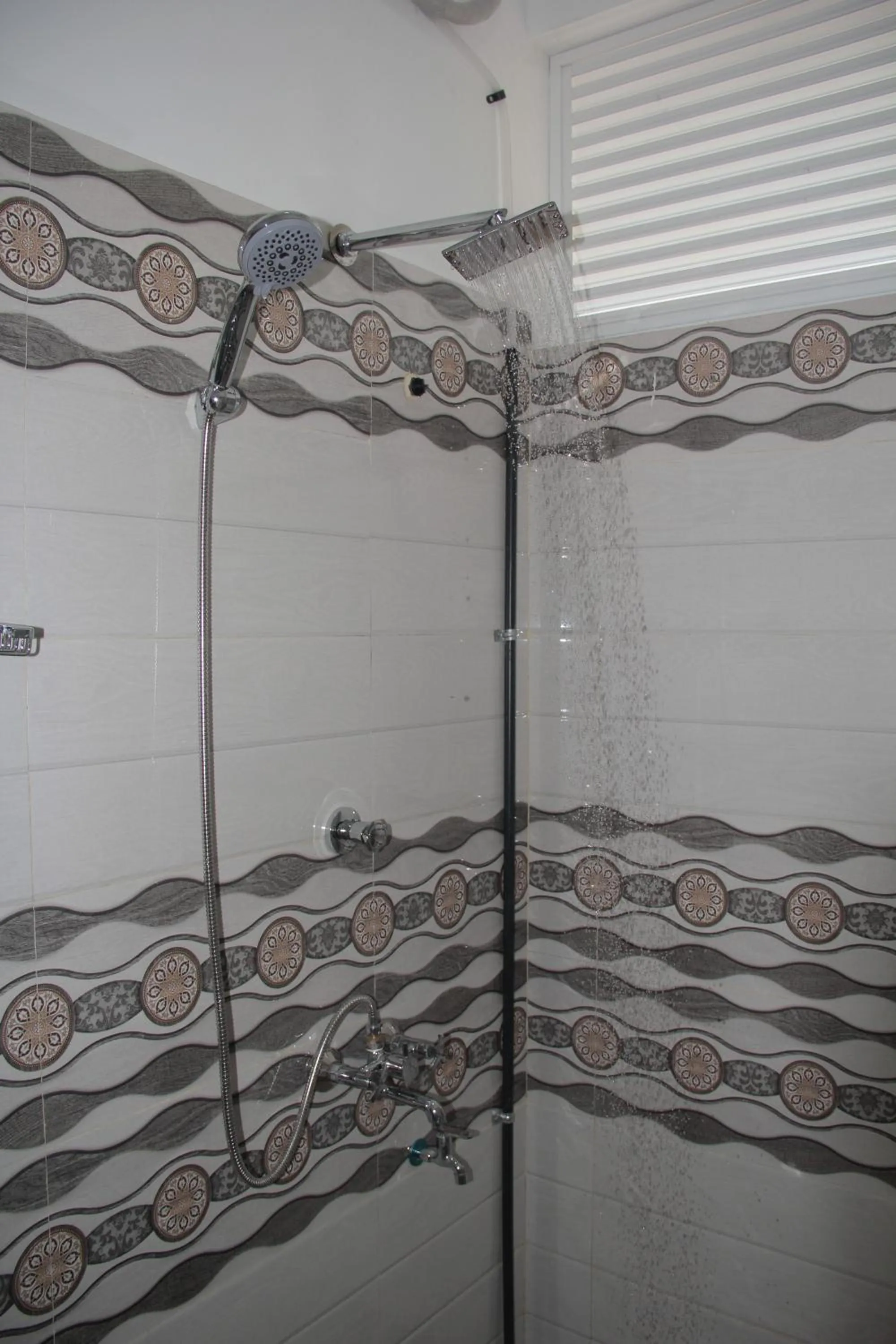 Shower in Butterfly Homestead Hotel