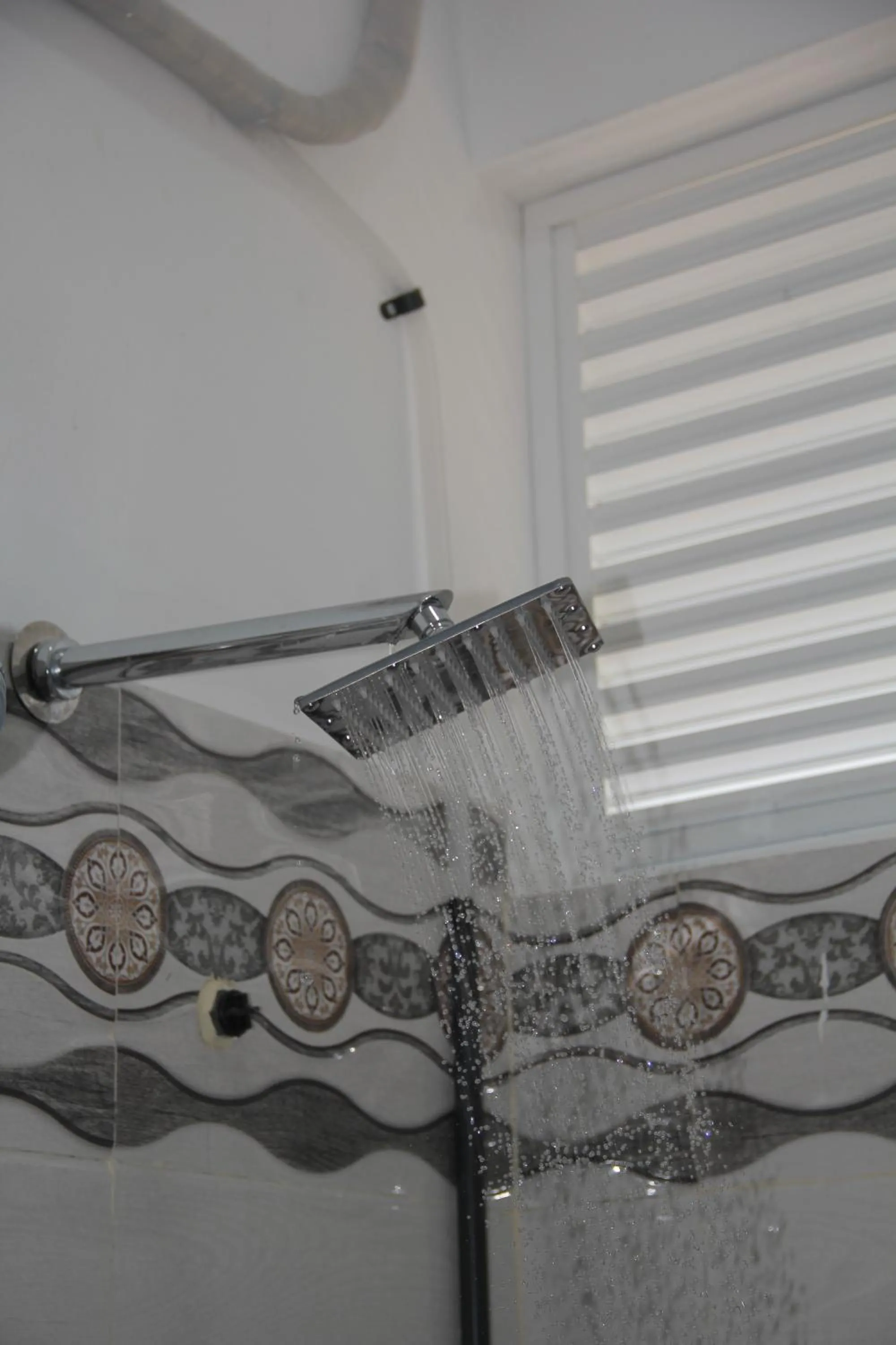 Shower in Butterfly Homestead Hotel