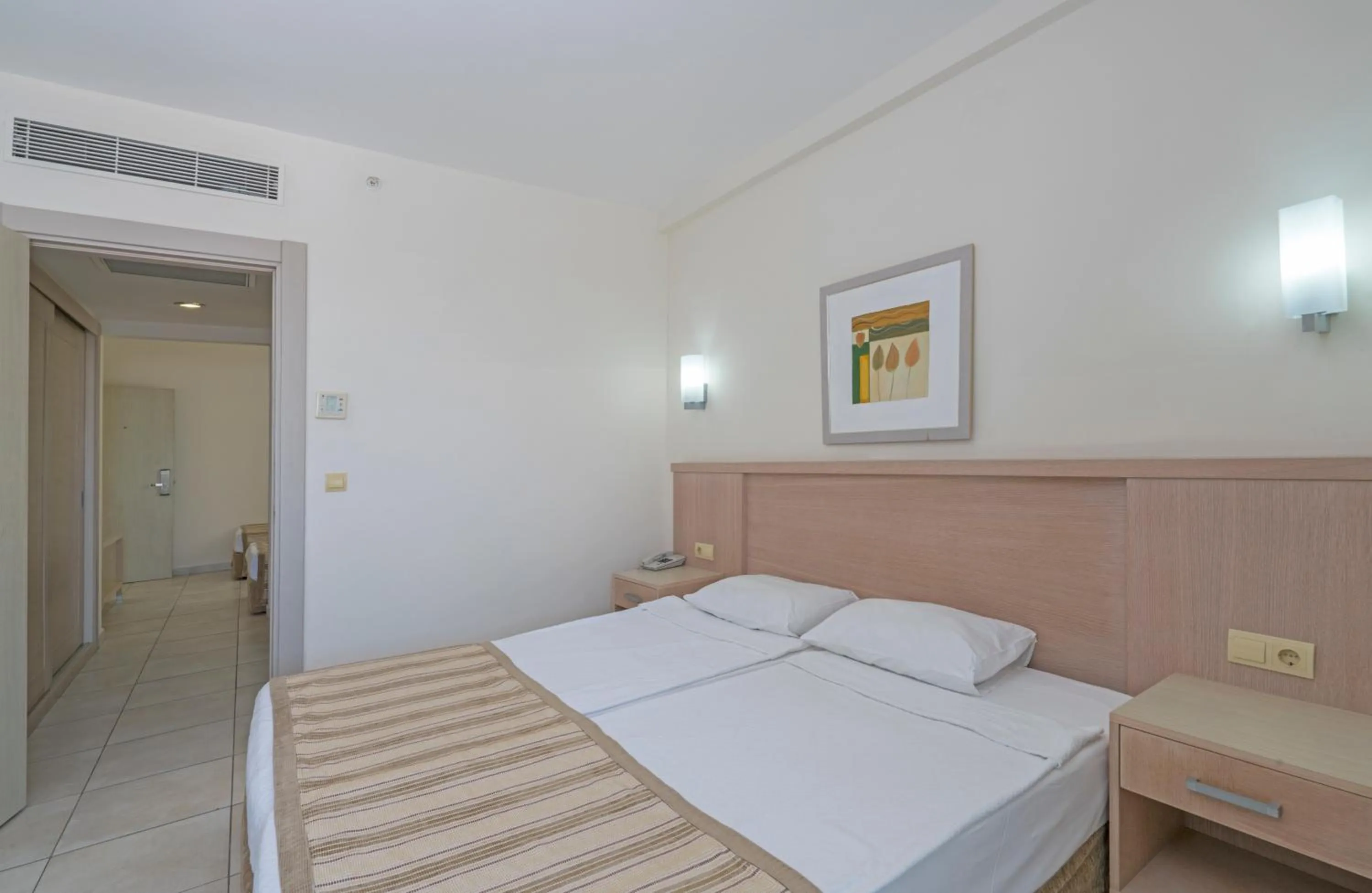 Bed in Sural Resort Hotel