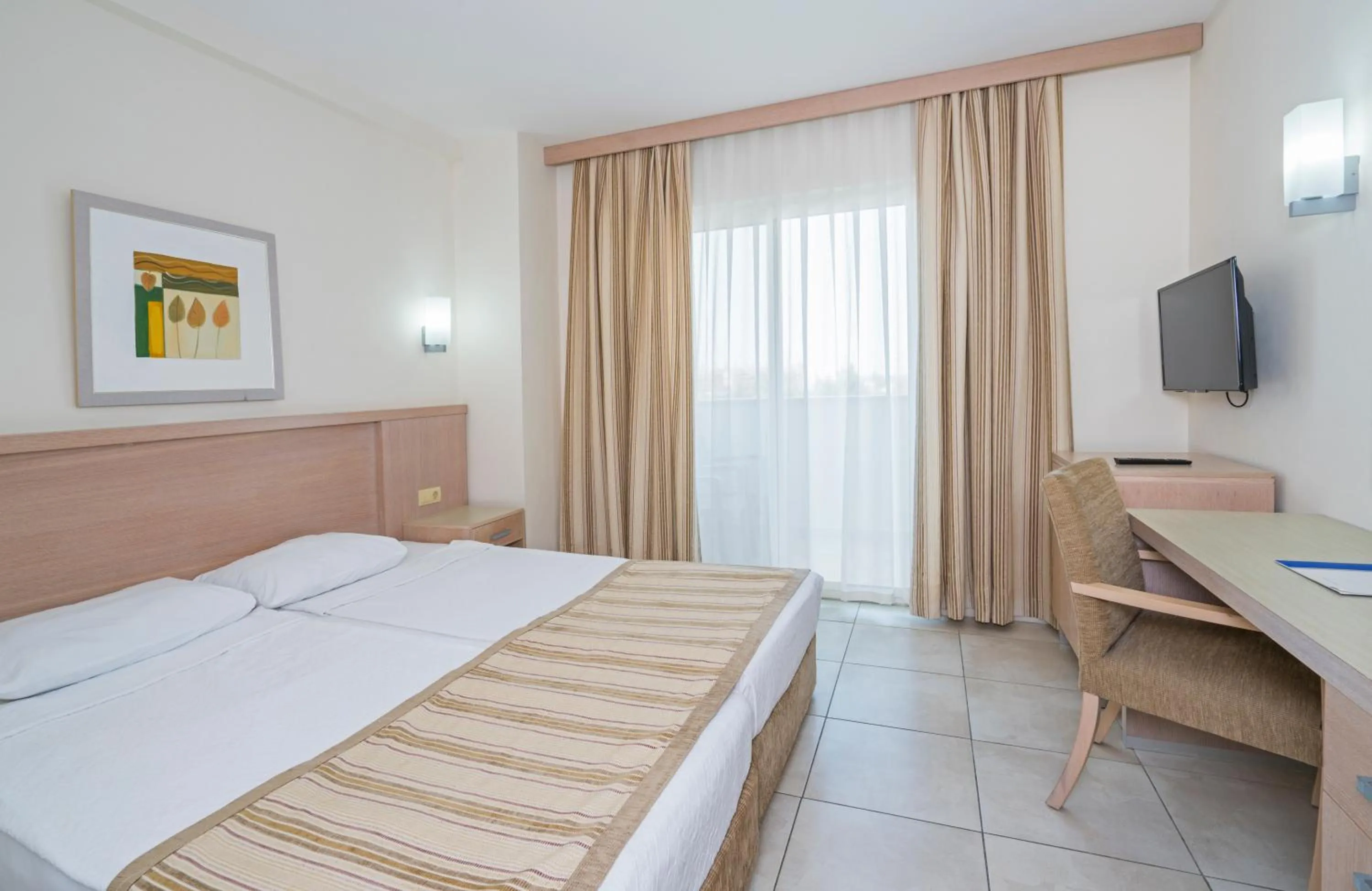 Bedroom, Bed in Sural Resort Hotel