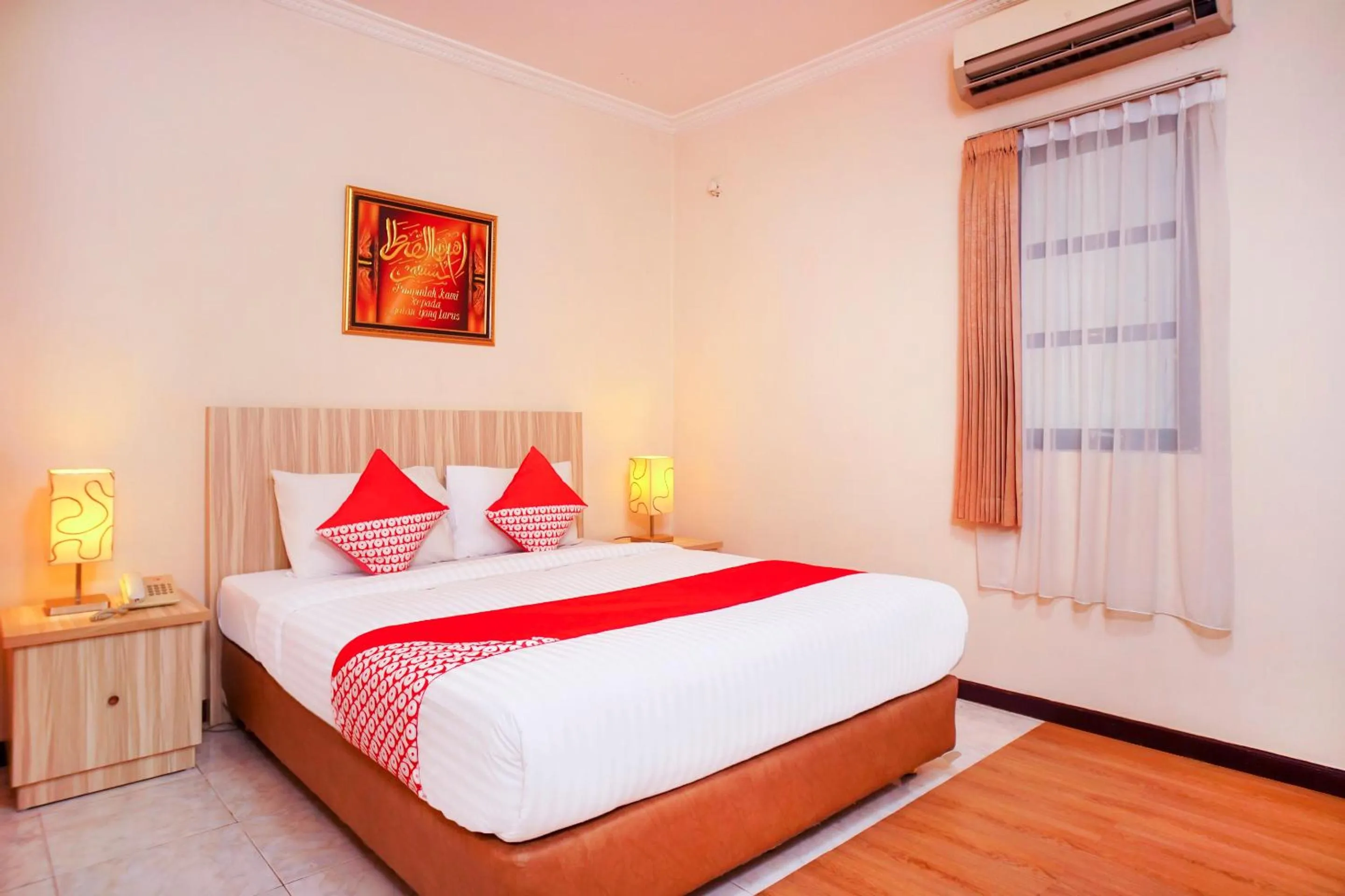 Bedroom in Capital O 142 Hotel Al Furqon Syariah