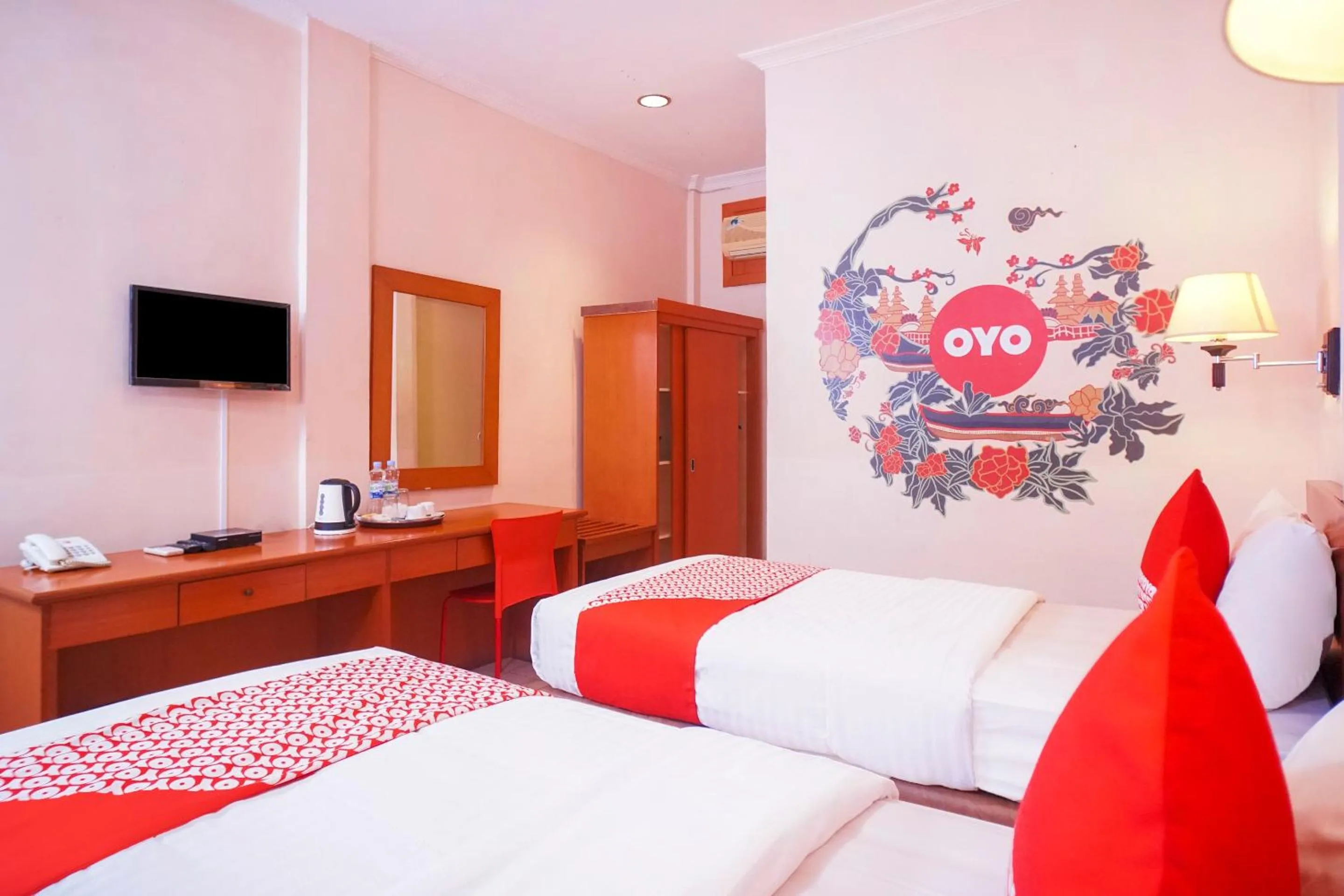 Bedroom in Capital O 142 Hotel Al Furqon Syariah