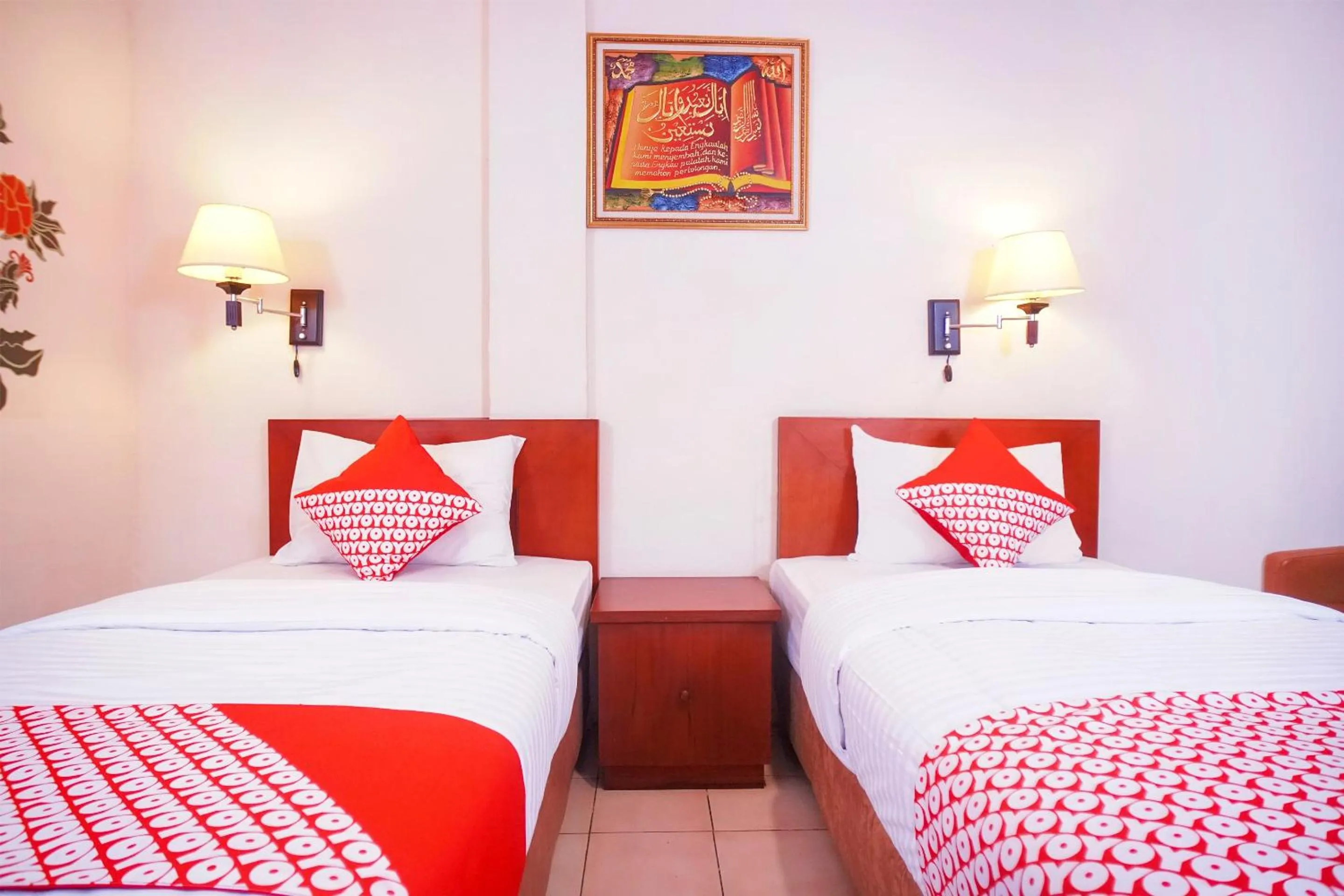 Bedroom in Capital O 142 Hotel Al Furqon Syariah