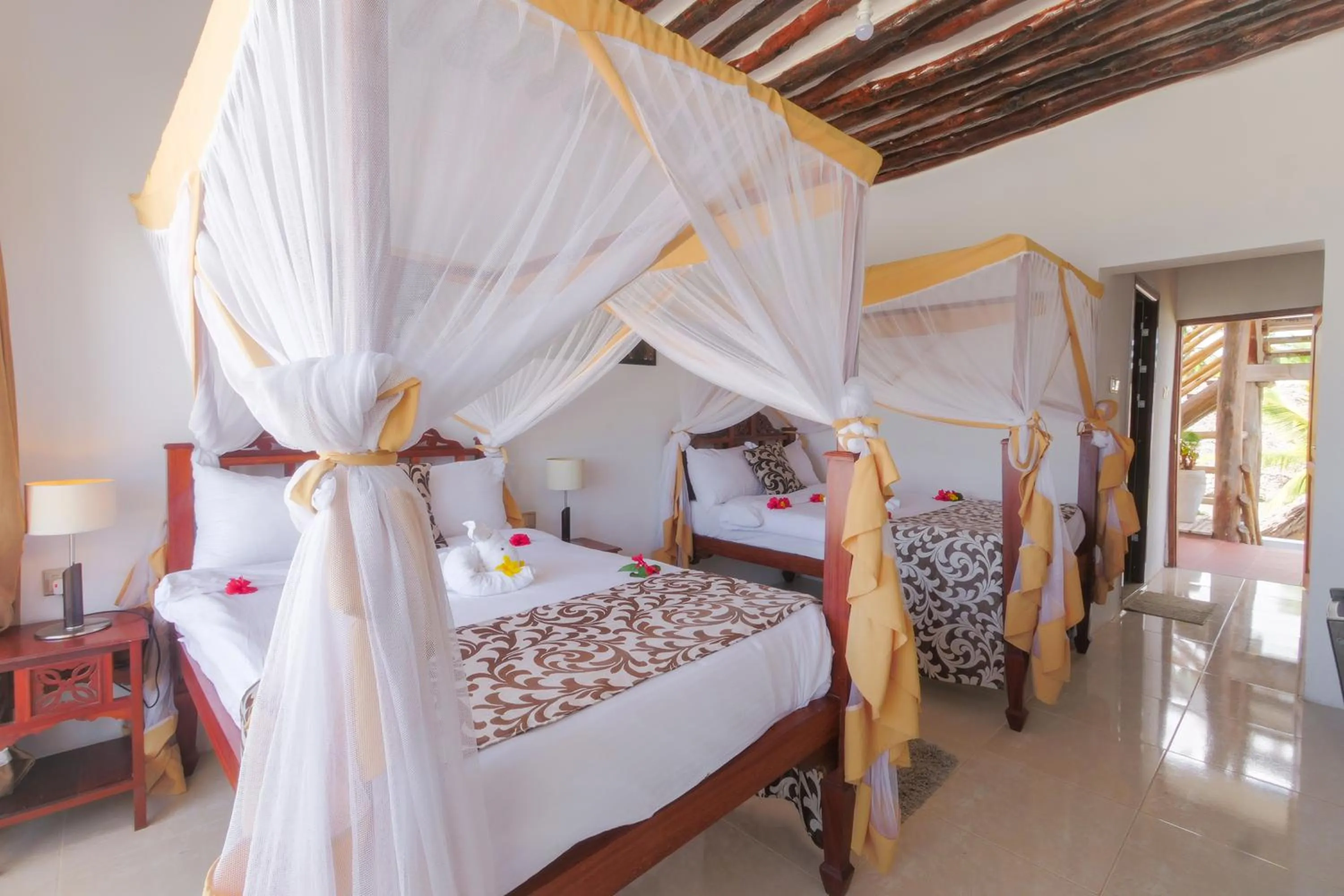 Bed in Isla Bonita Zanzibar Beach Resort