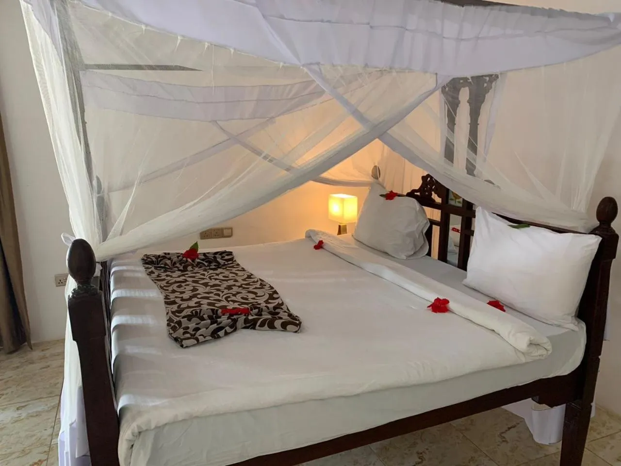 Bed in Isla Bonita Zanzibar Beach Resort