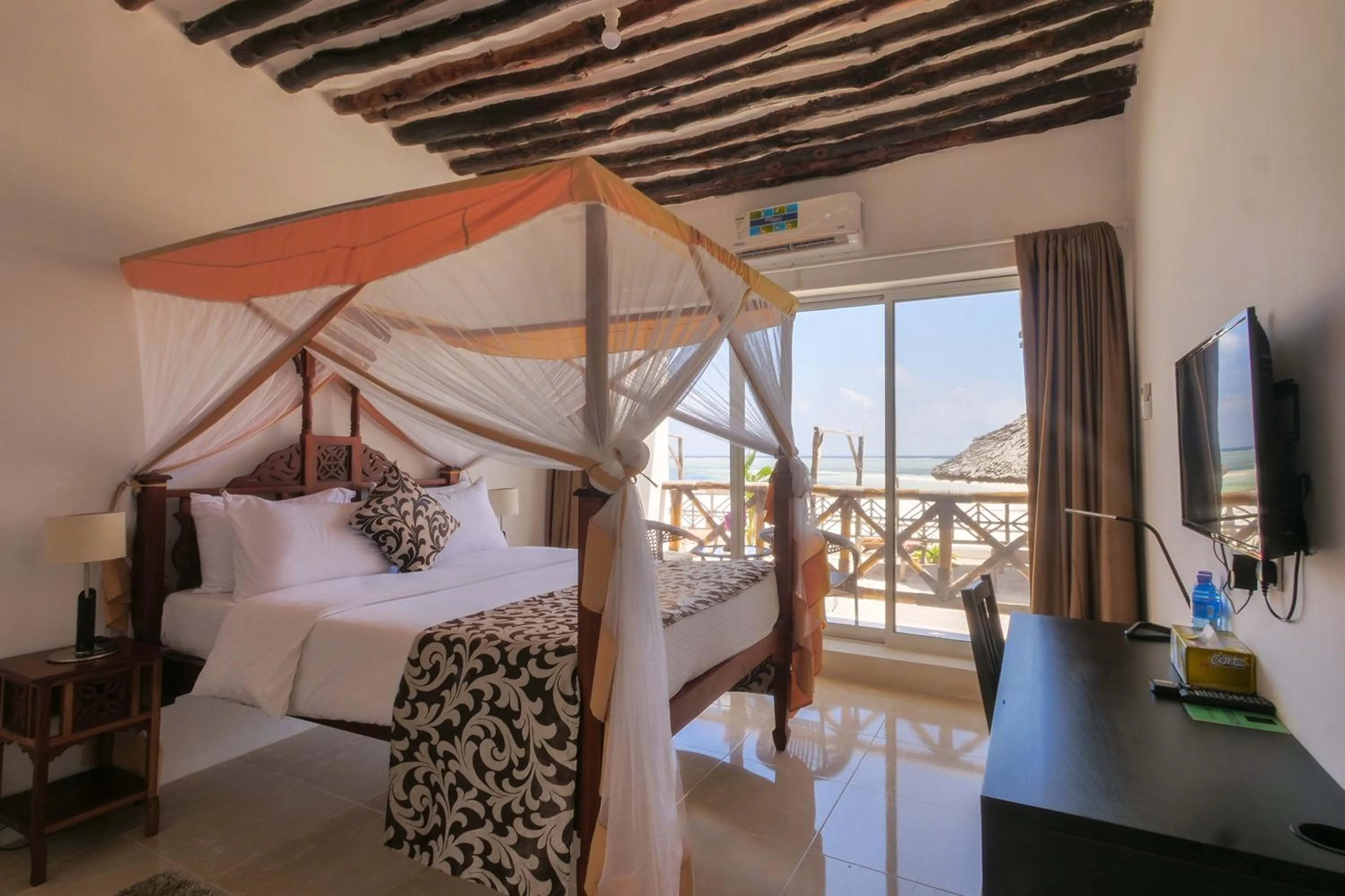 Photo of the whole room, Bed in Isla Bonita Zanzibar Beach Resort