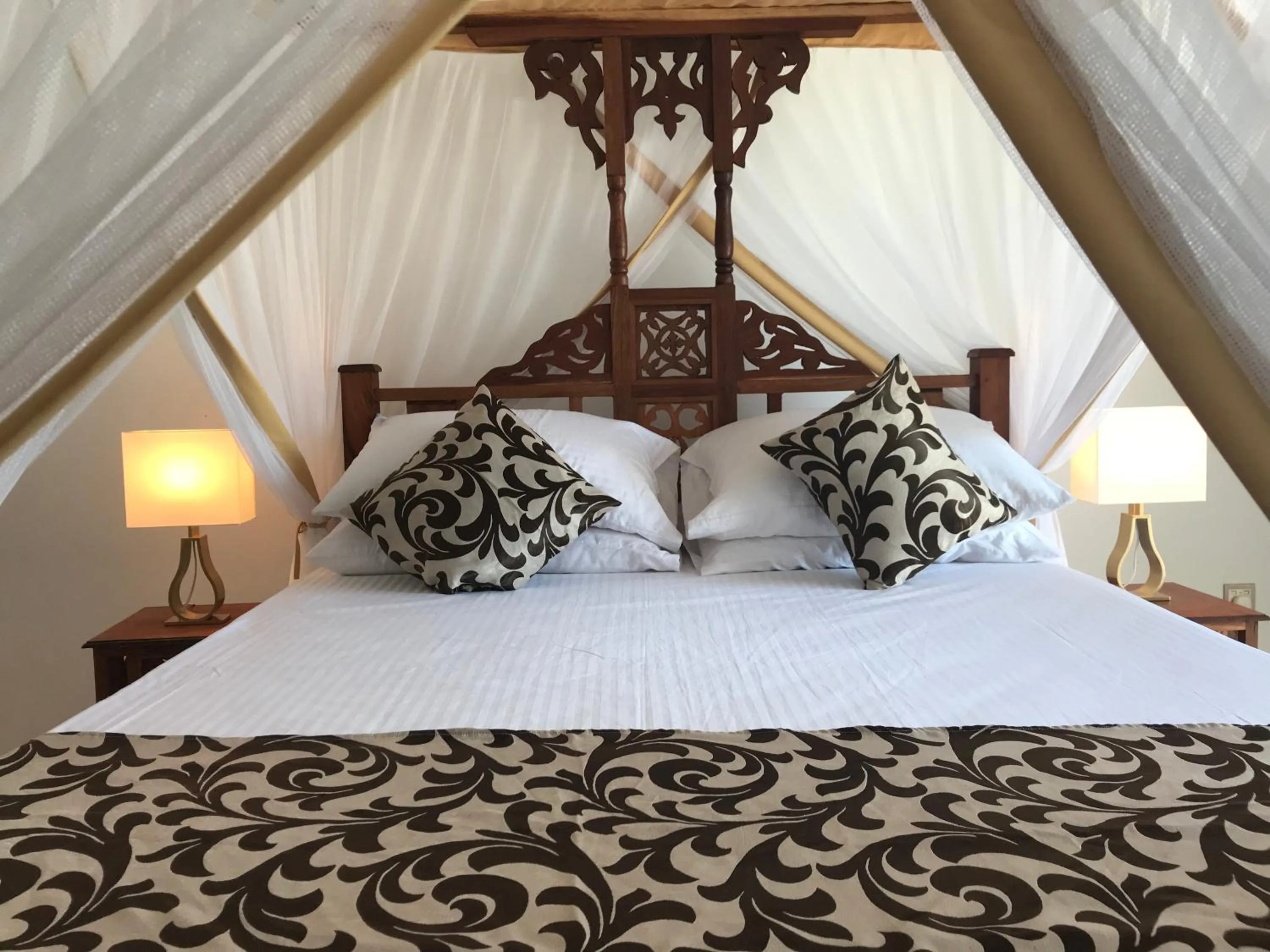 Bed in Isla Bonita Zanzibar Beach Resort