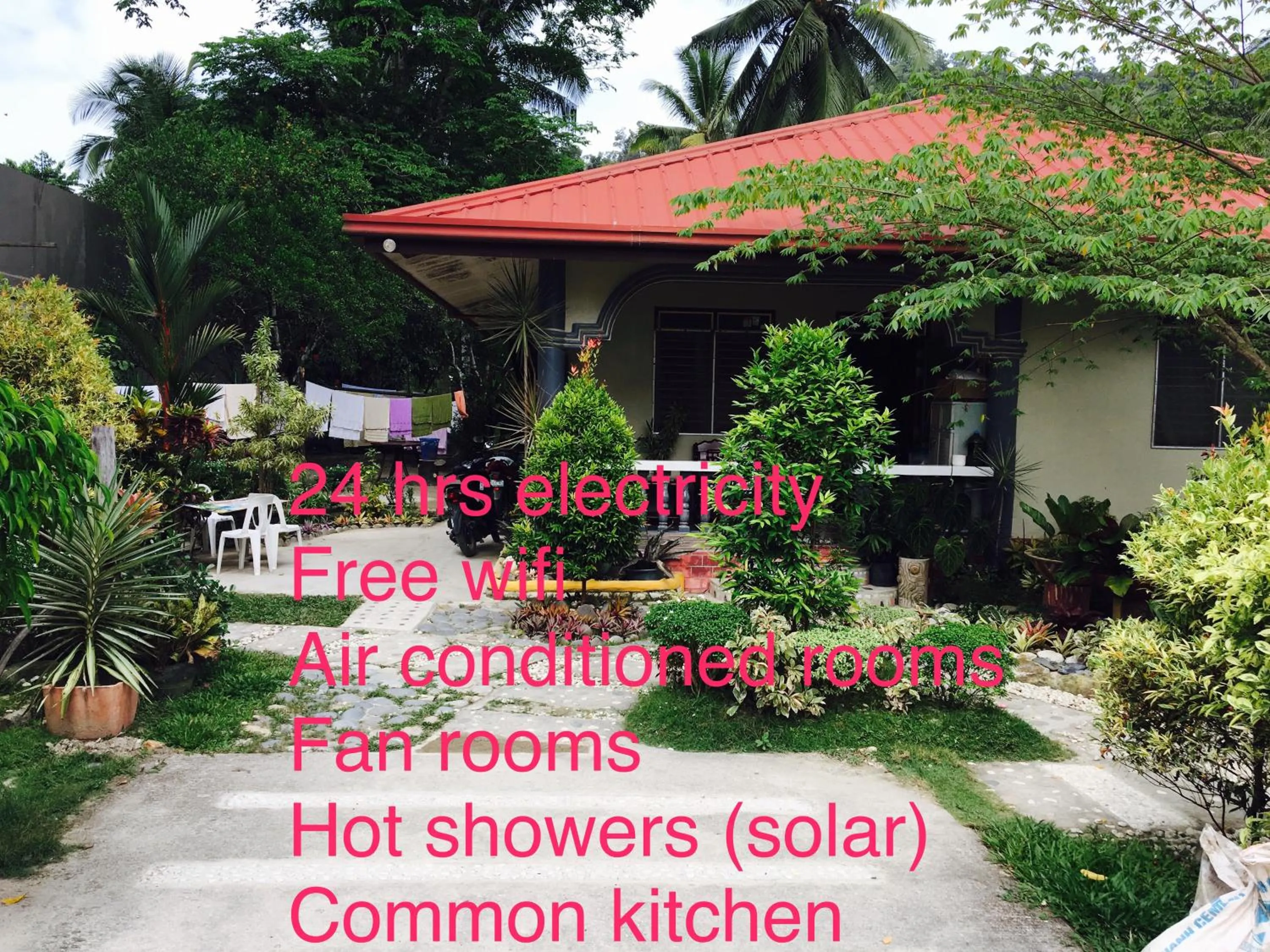 Text overlay in Pisces Tourist Inn - Port Barton