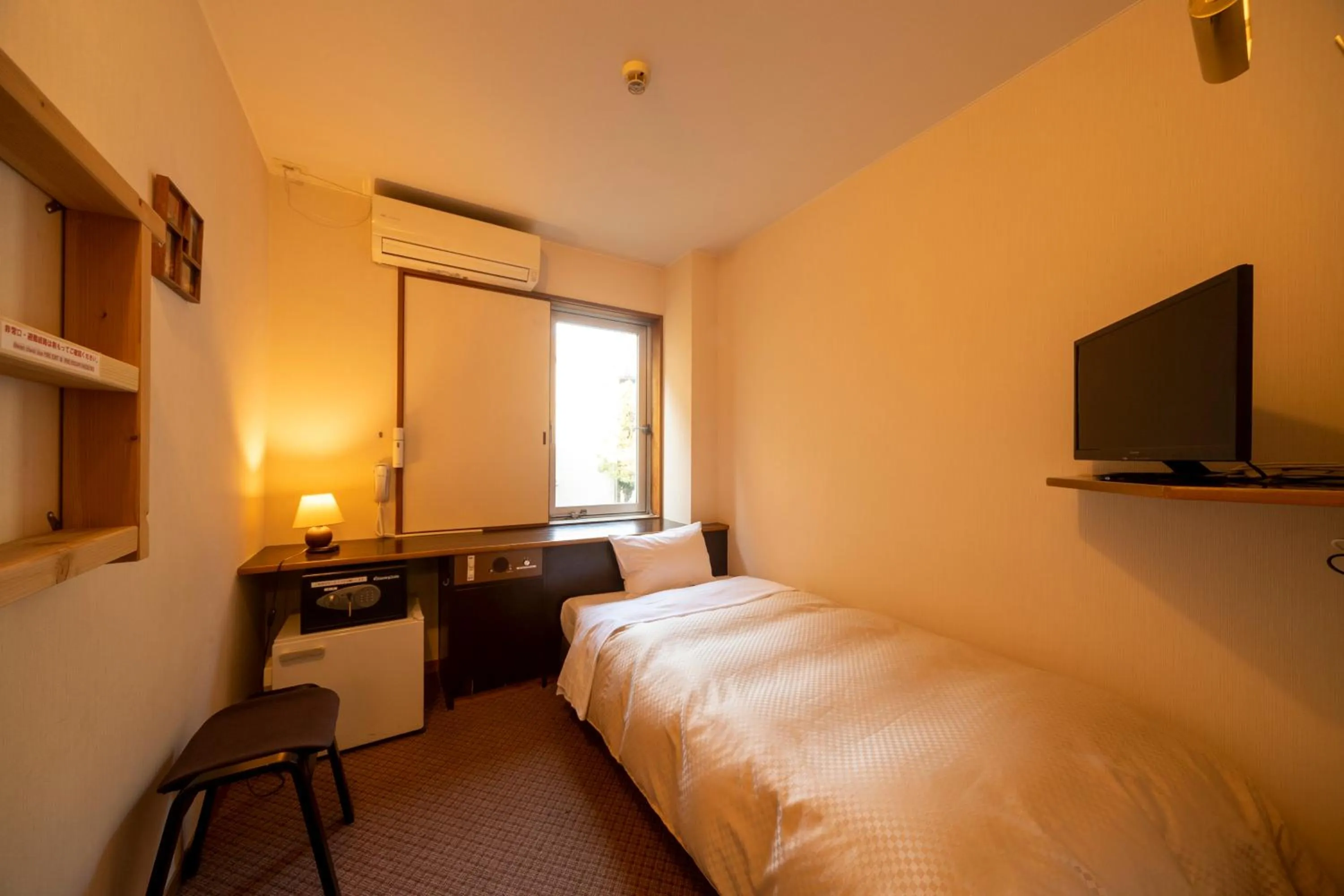 Bed in Hotel Miya Rikyu