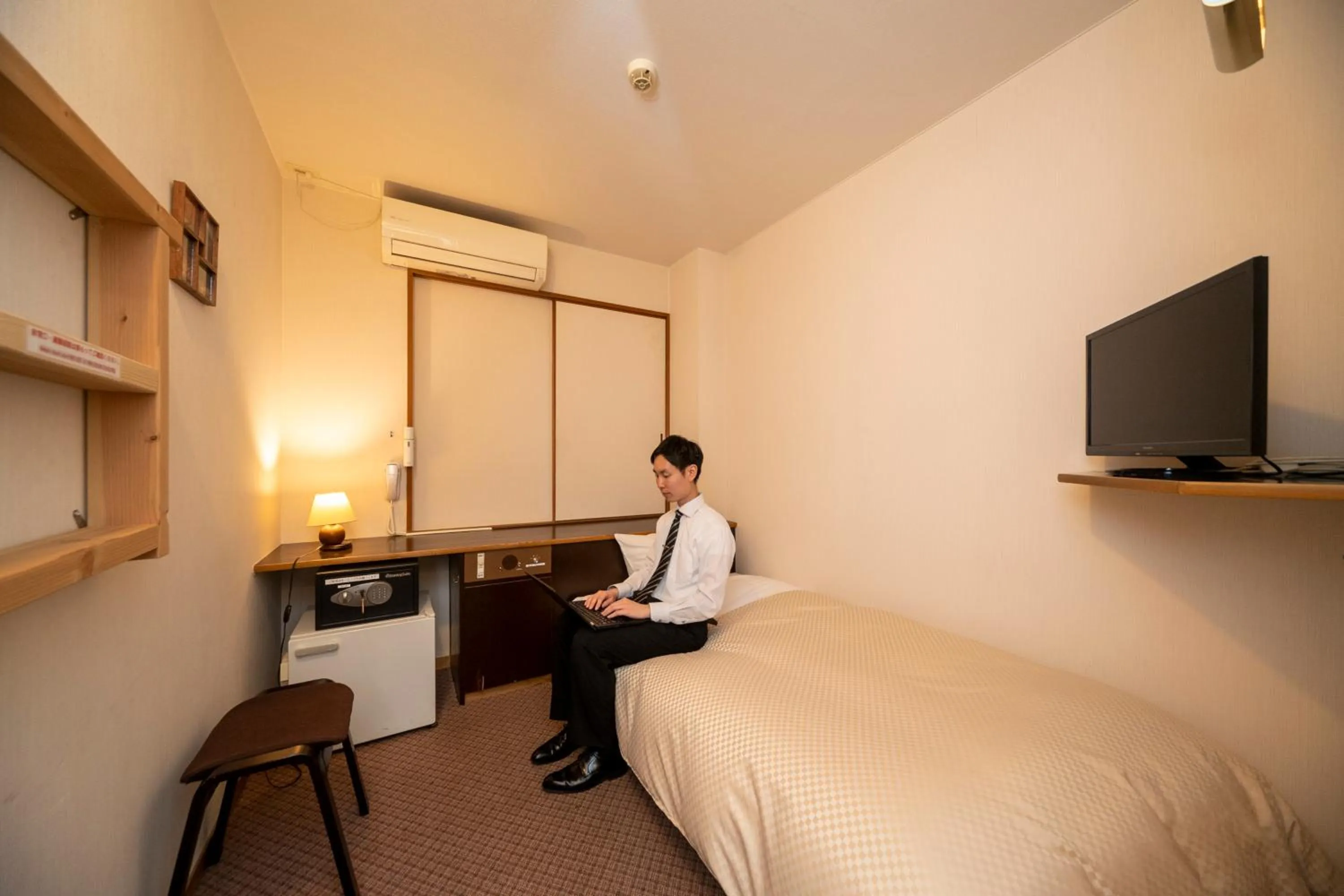 Bed in Hotel Miya Rikyu