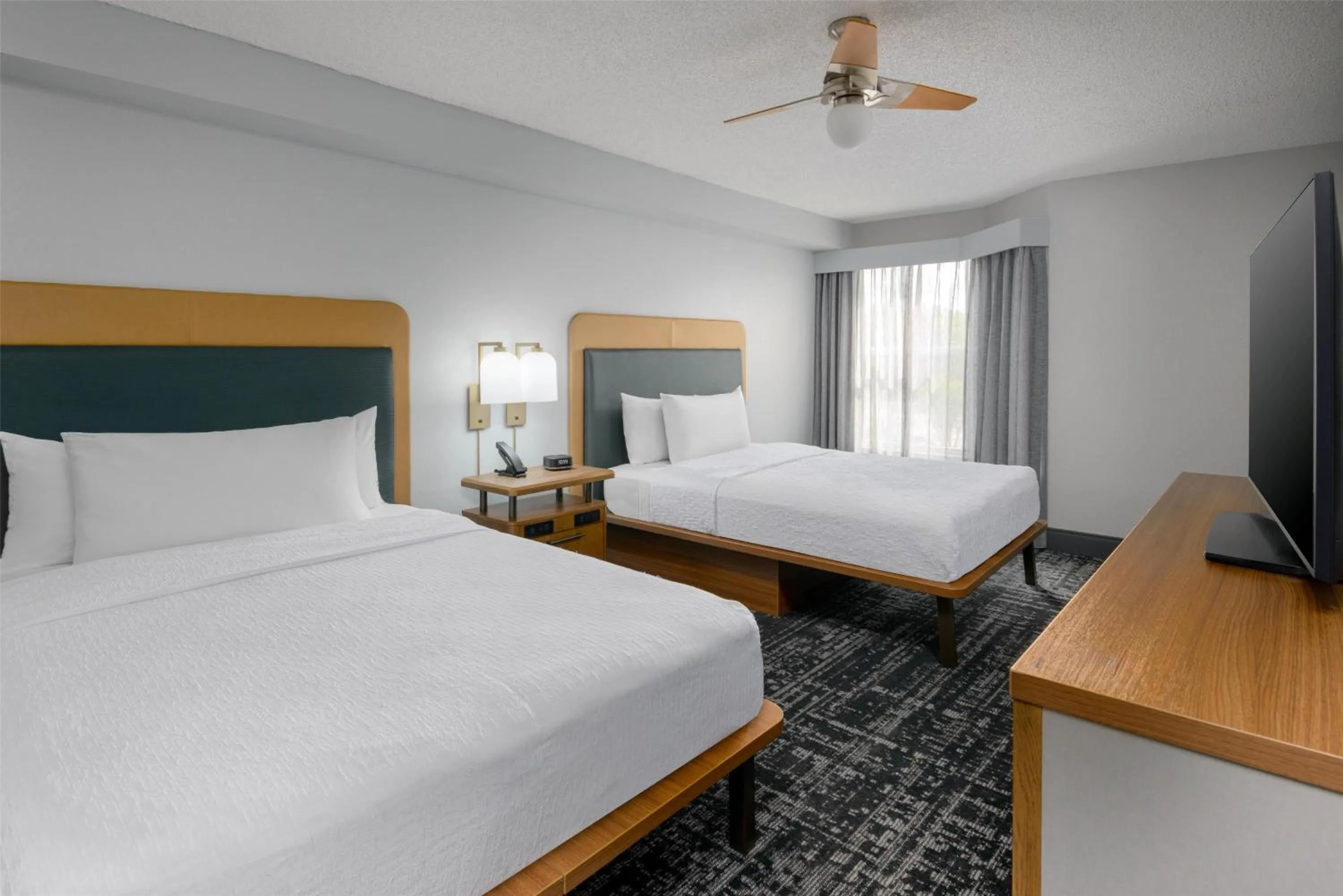 Bed in Homewood Suites by Hilton Orlando-UCF Area