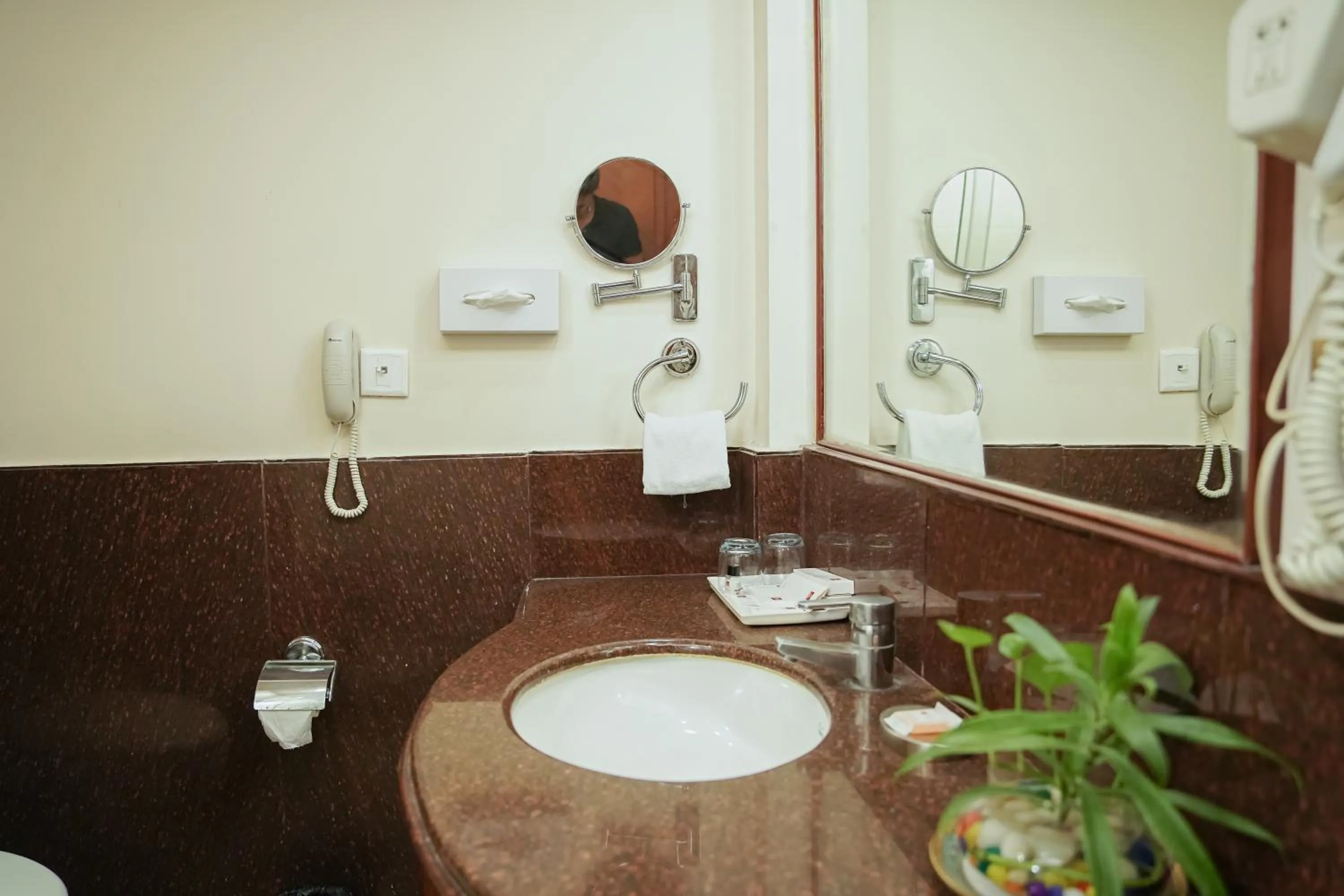 Bathroom in Clarion Bella Casa at Airport