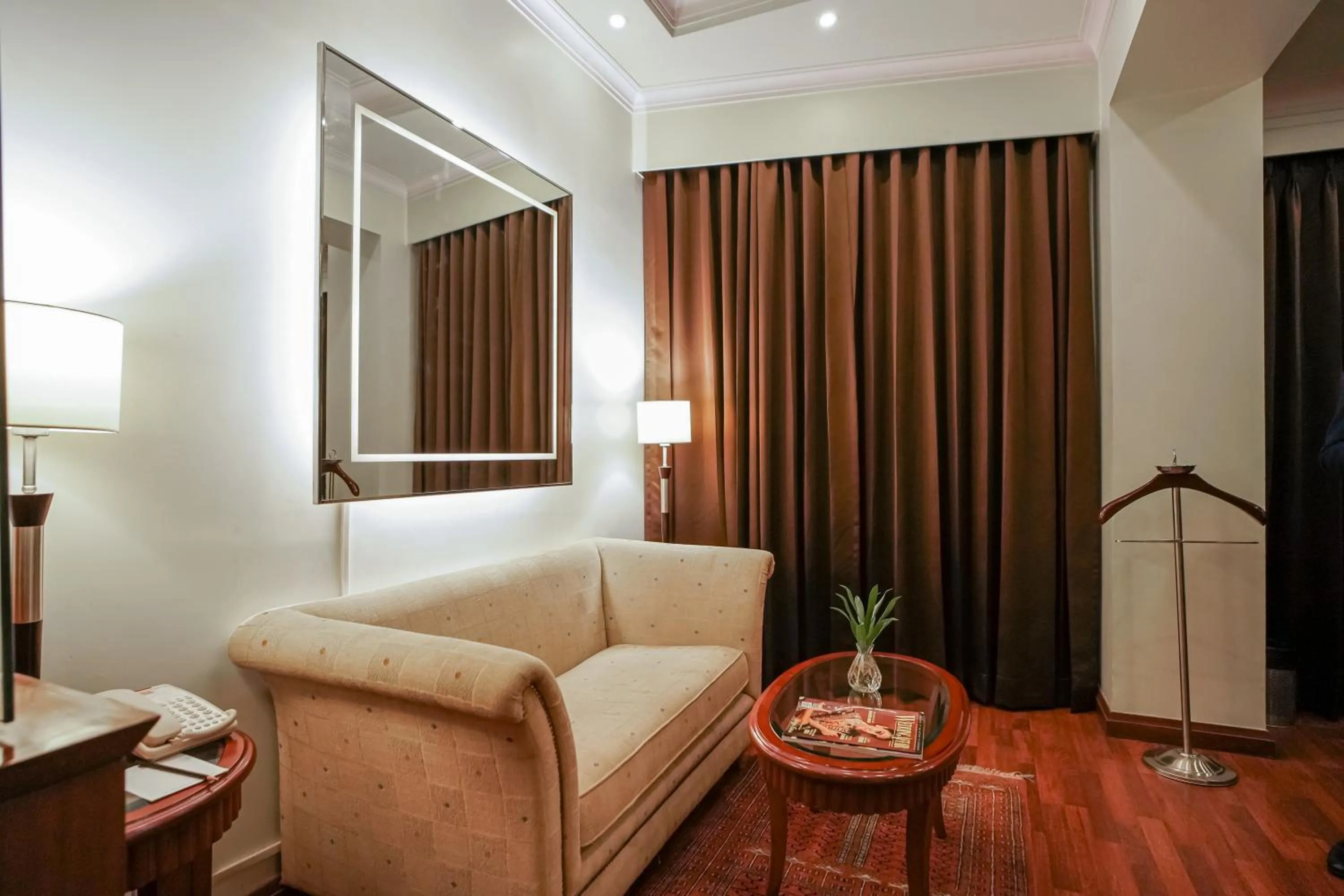 Communal lounge/ TV room in Clarion Bella Casa at Airport