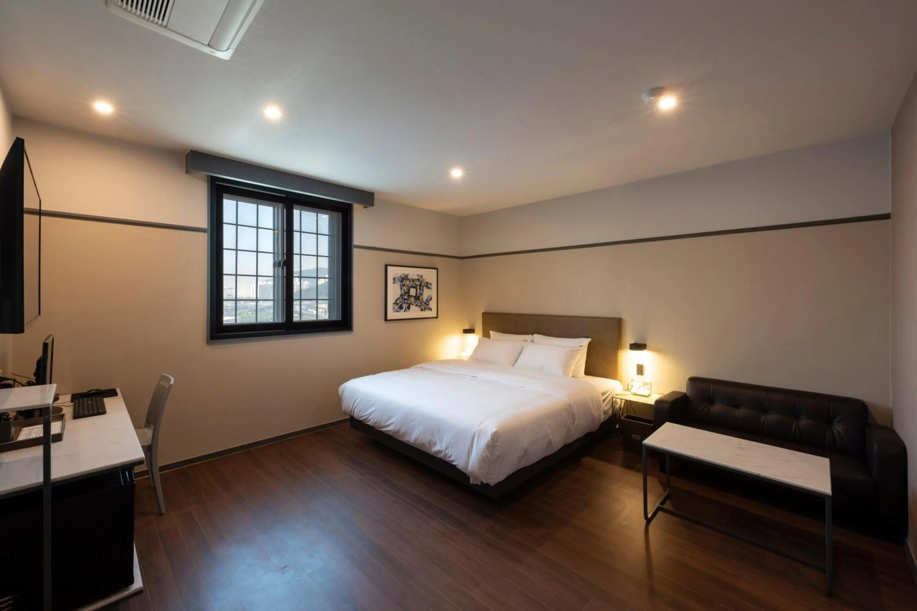 Bed in Brown-Dot Hotel Gupo