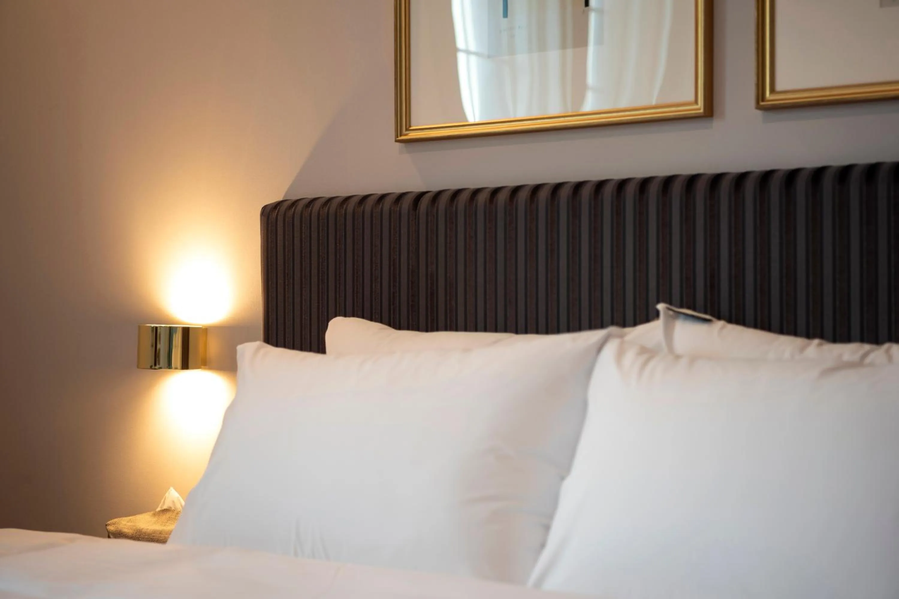 Bed in Brown-Dot Hotel Gupo