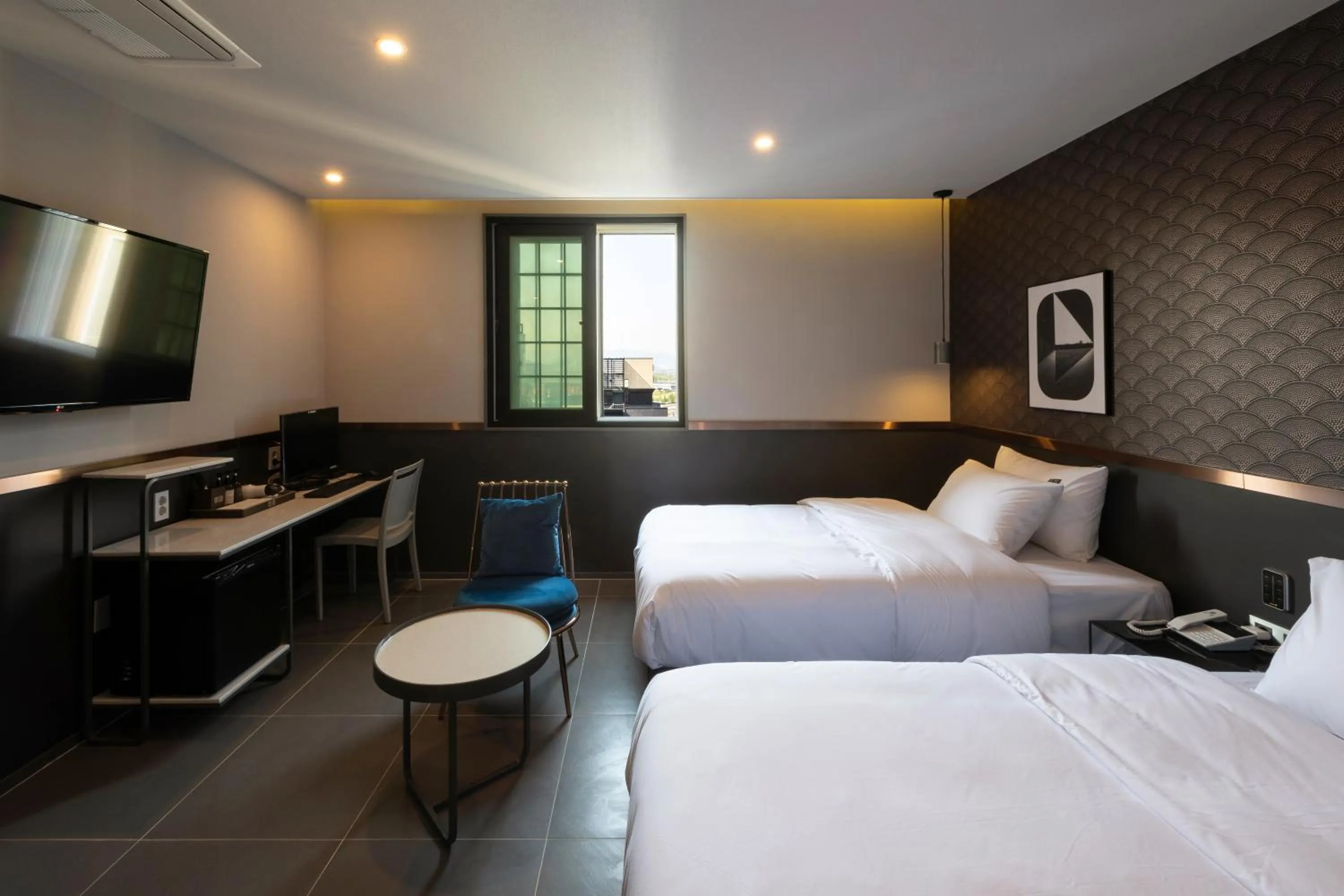 Bed in Brown-Dot Hotel Gupo