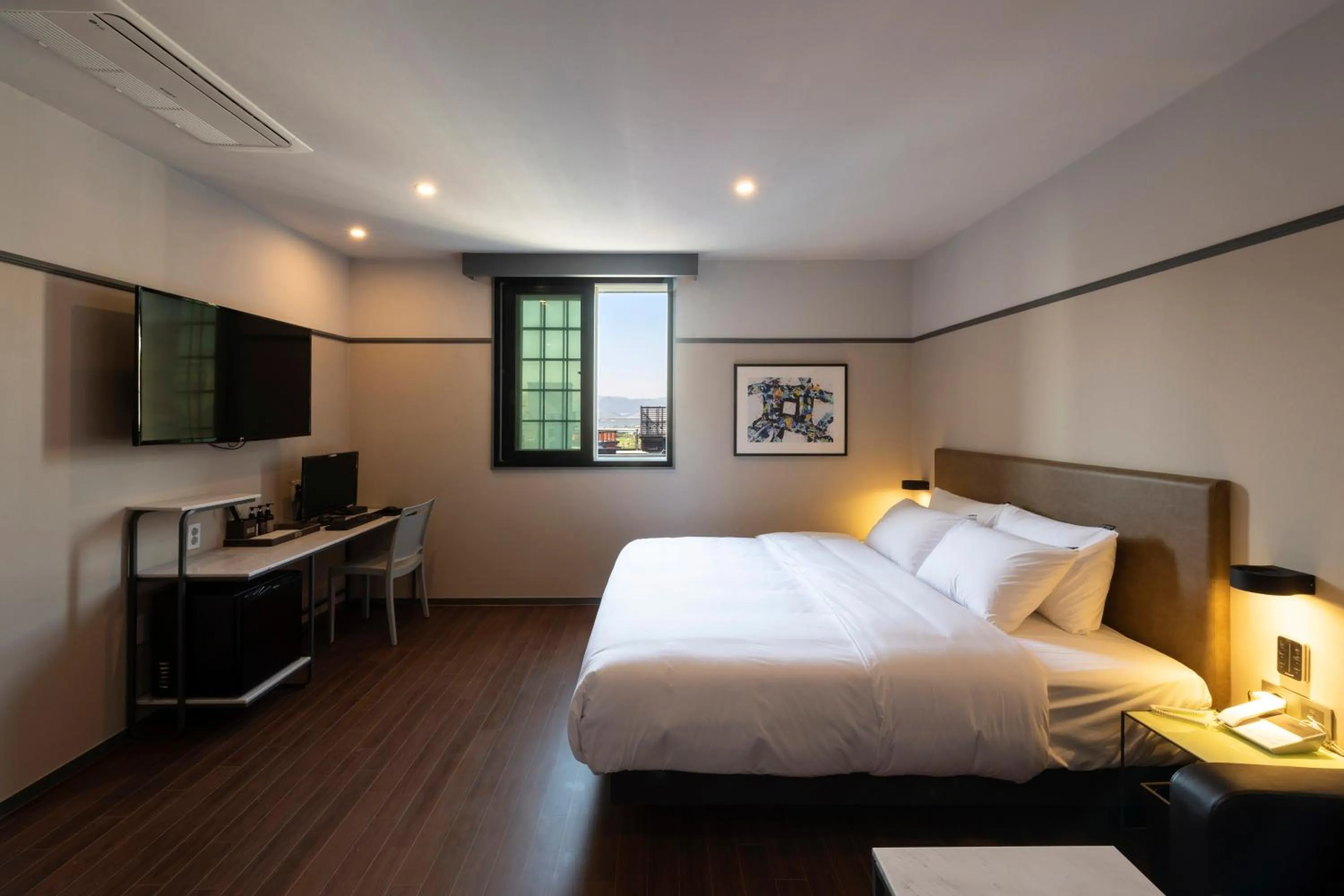 Bed in Brown-Dot Hotel Gupo