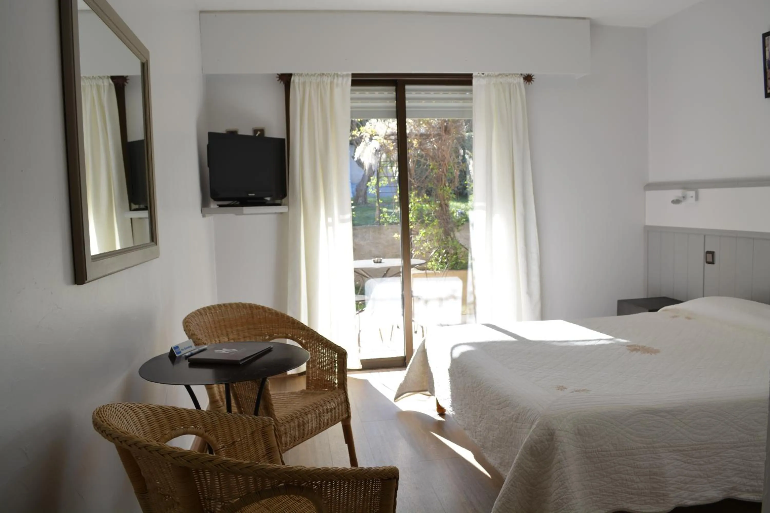 Photo of the whole room, Bed in Hôtel Le Colombier