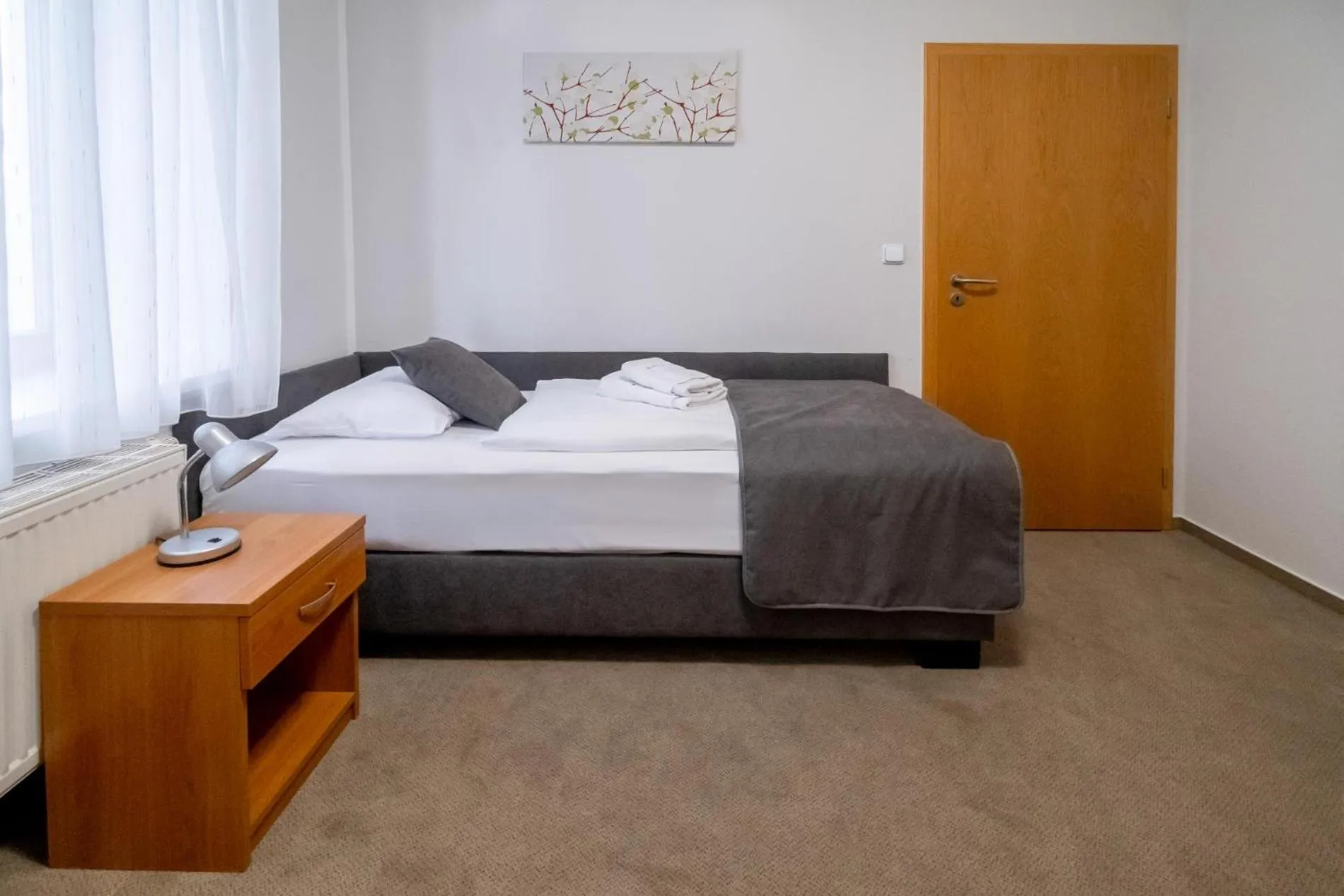 Bed in Relax Hotel Stork