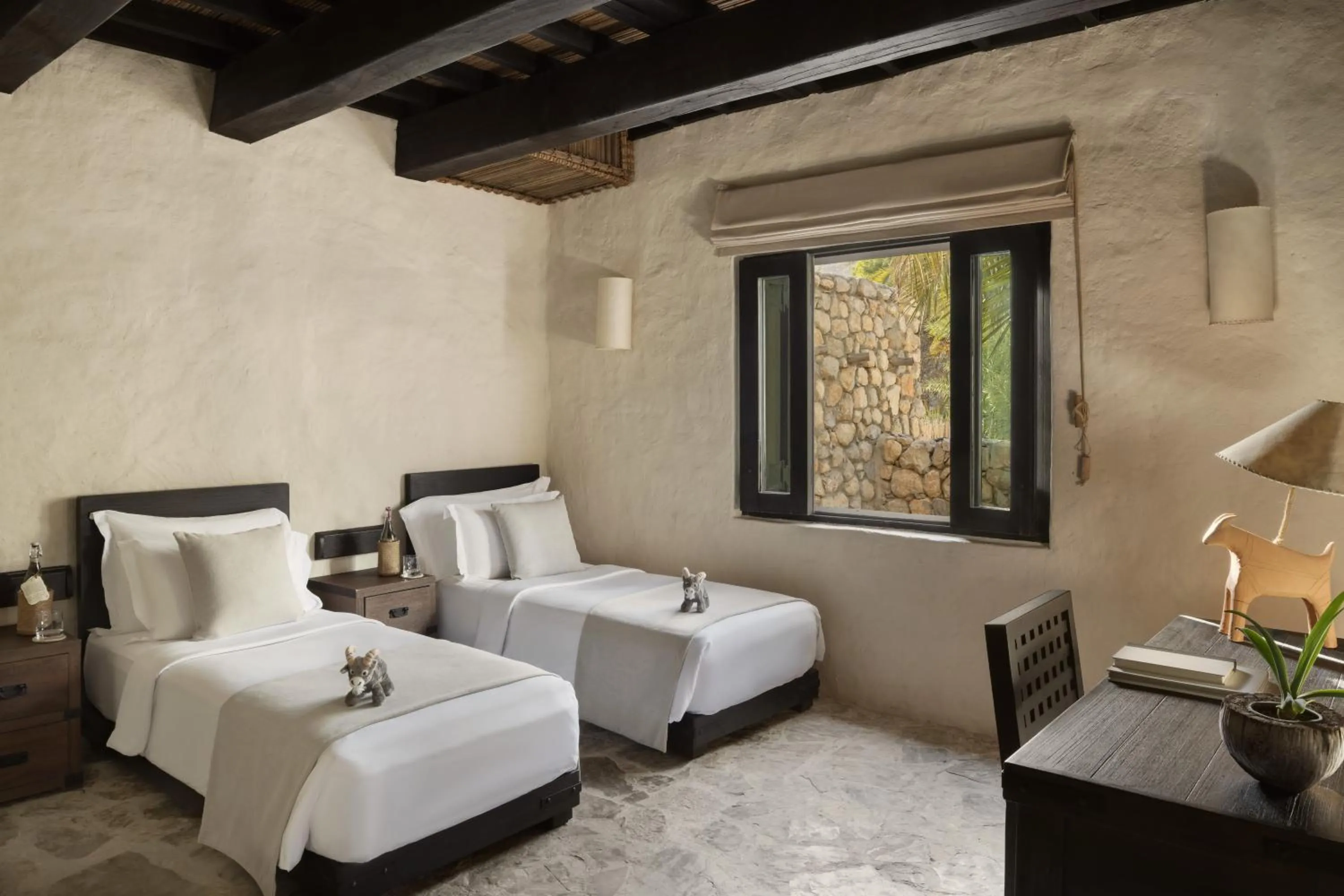 Bed in Six Senses Zighy Bay