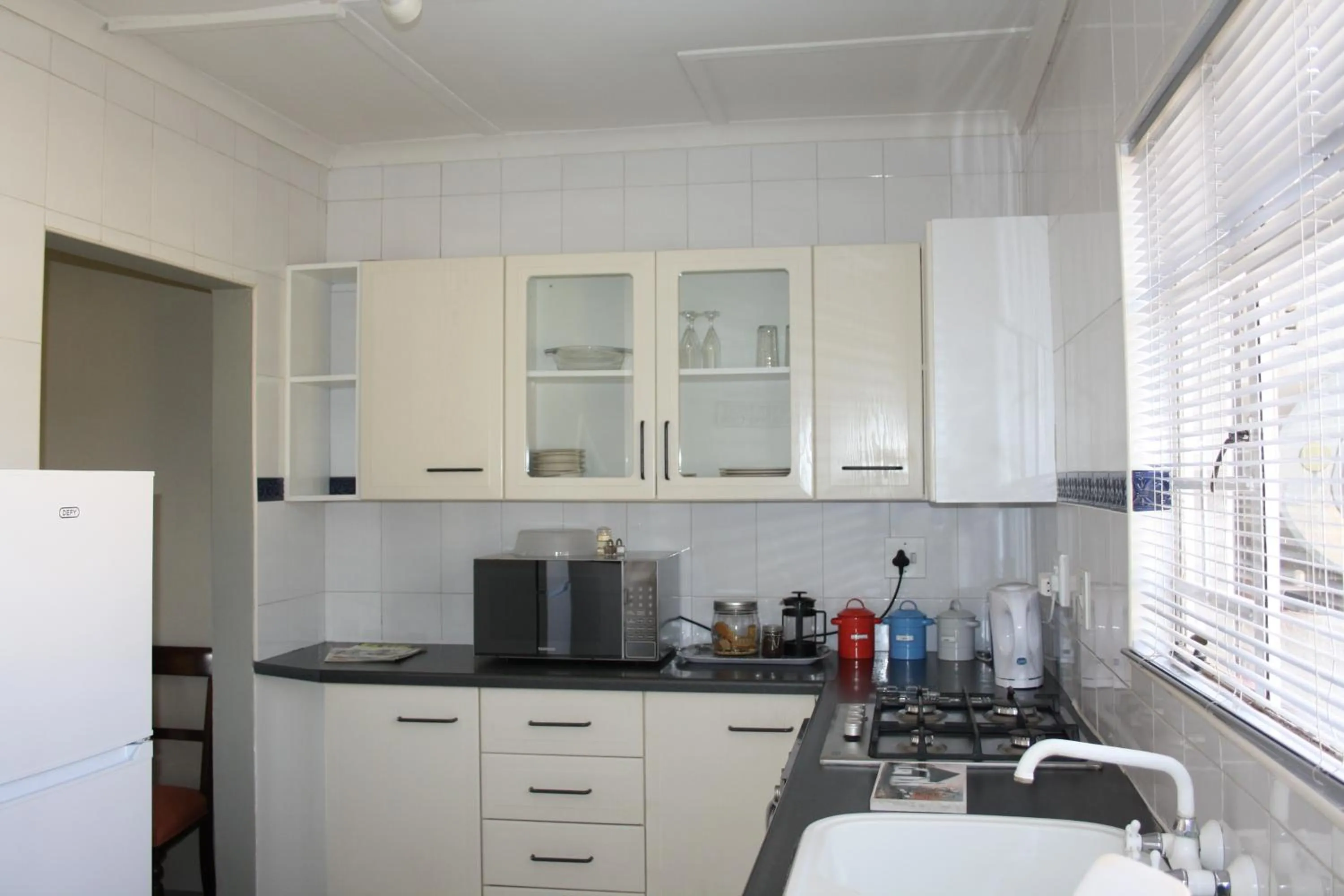 Kitchen or kitchenette in Misty Morn Cottages