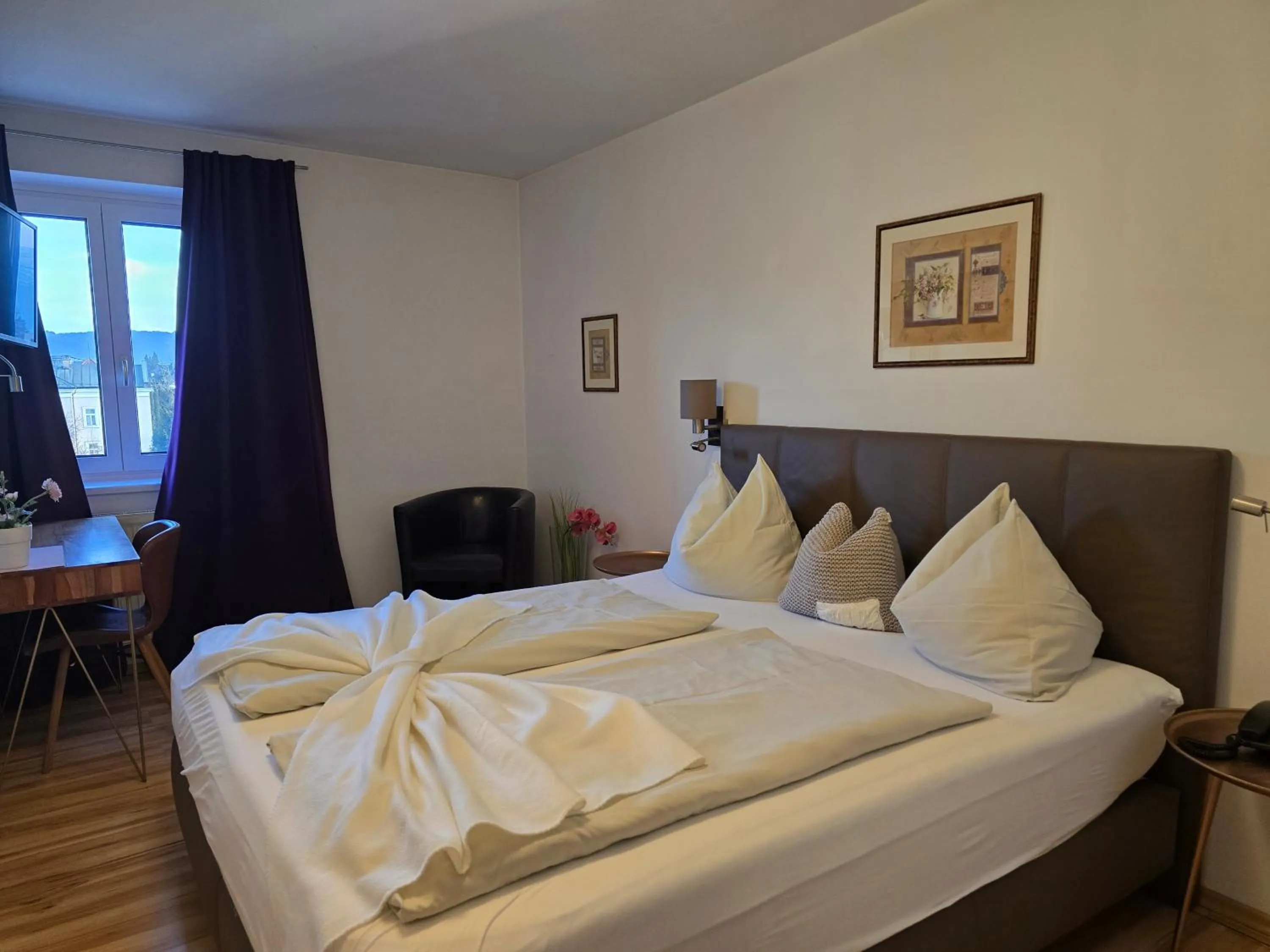 Bed in Hotel Hafnerwirt