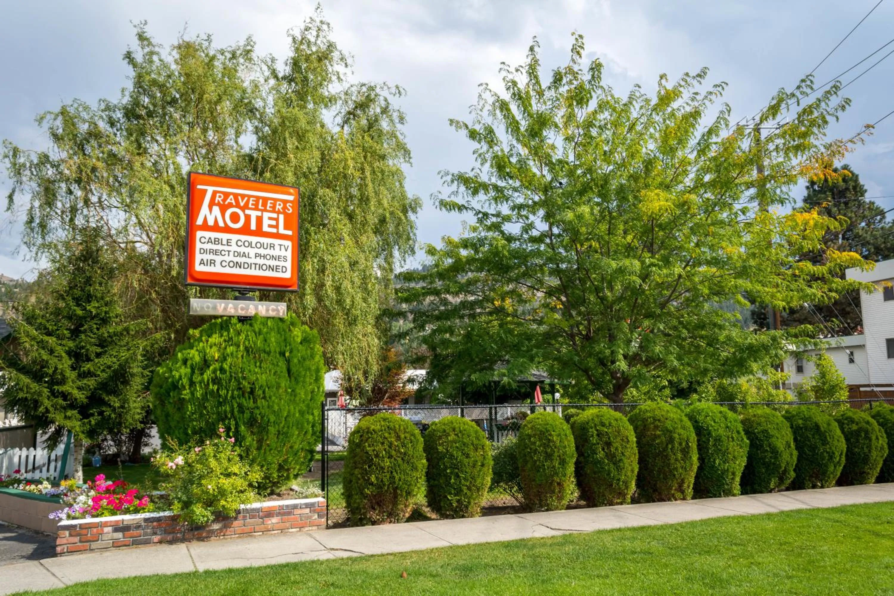 Property logo or sign in Traveler's Motel Penticton
