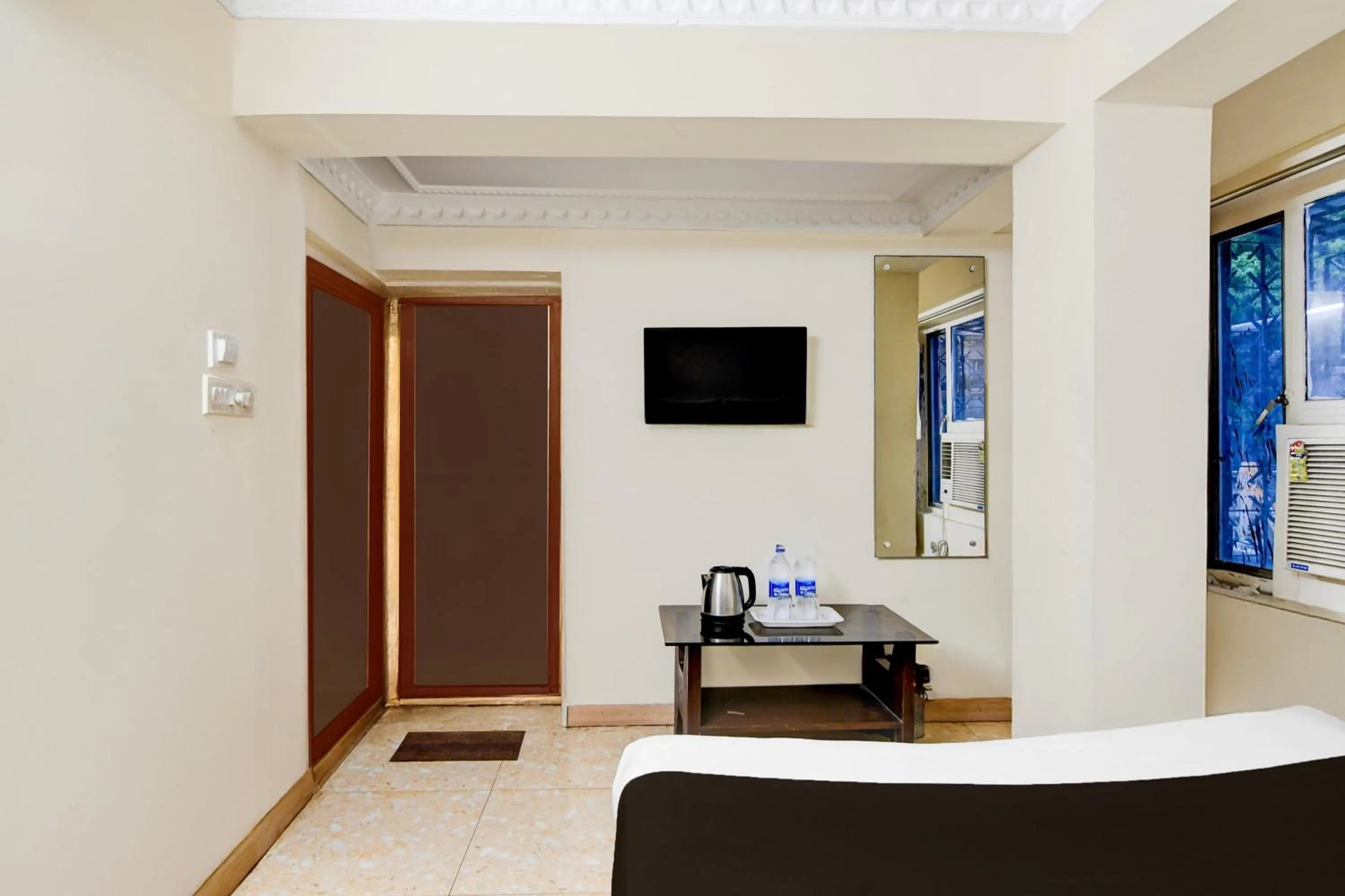 Bedroom in Super Hotel O Sarat Bose Road formerly Shree Guest House