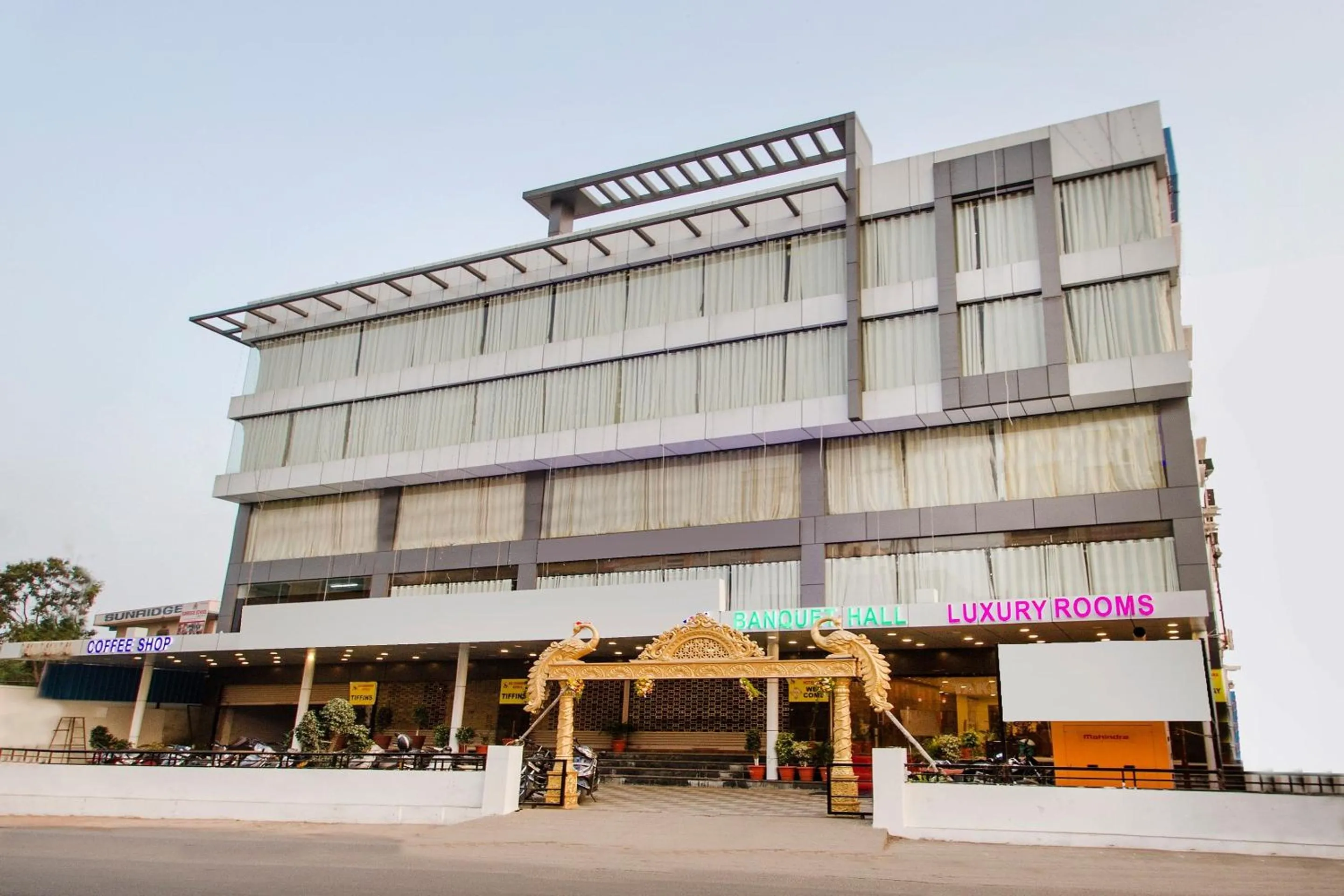 Facade/entrance in Capital O Wild Wings Hotel Near Omni Hospital Lane Nagole main road