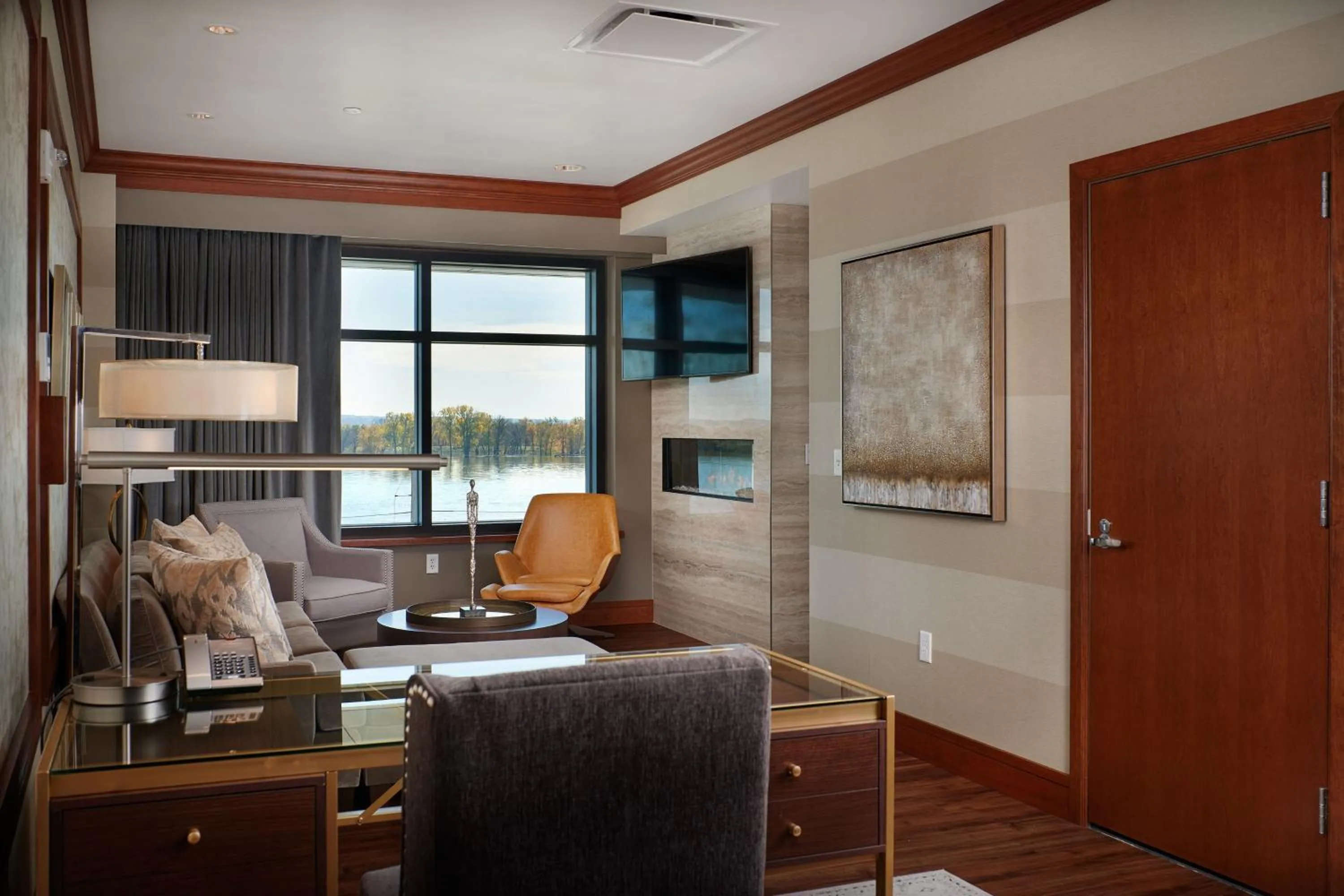 Living room in The Merrill Hotel & Conference Center, Muscatine, a Tribute Portfolio Hotel