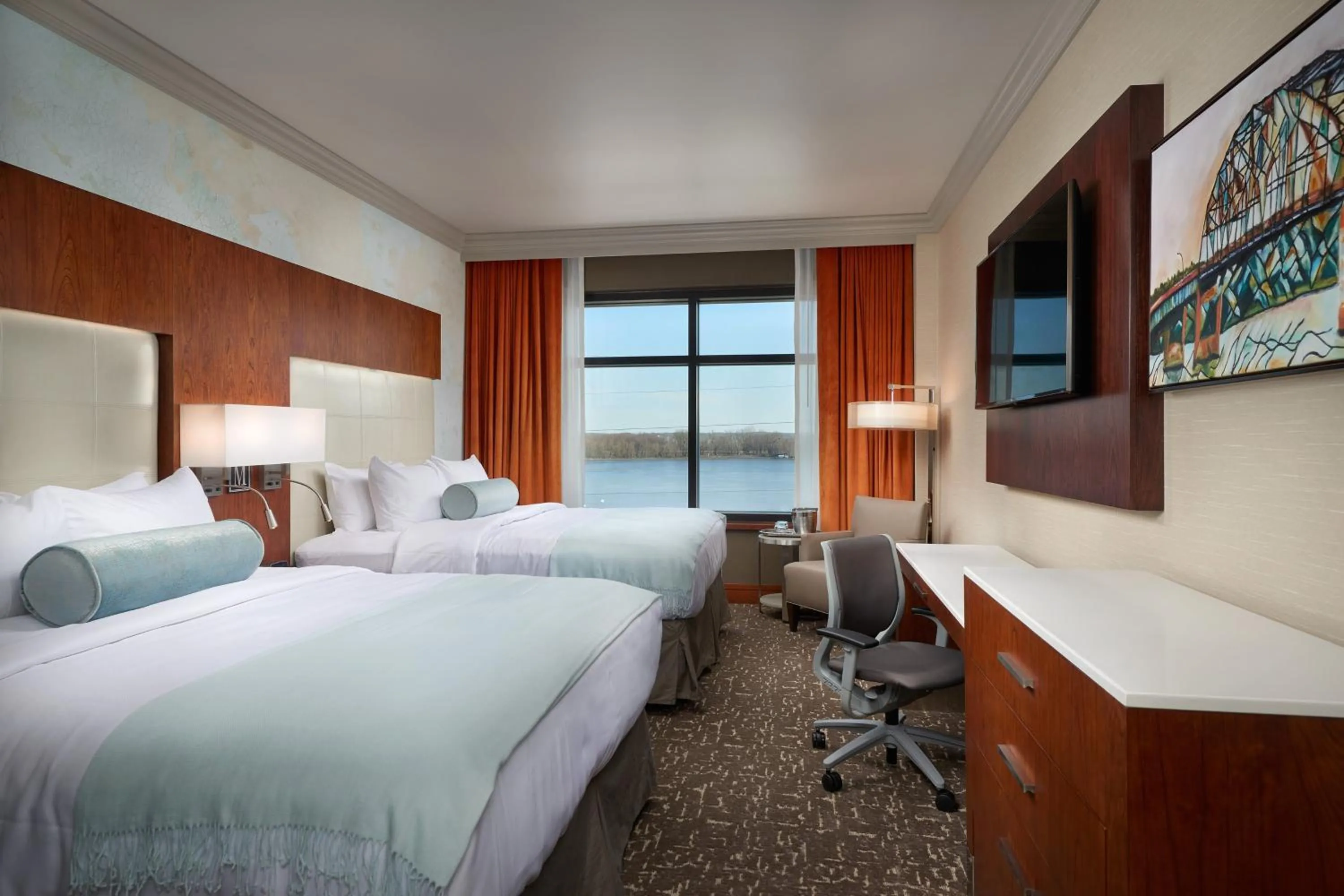 Photo of the whole room, Bed in The Merrill Hotel & Conference Center, Muscatine, a Tribute Portfolio Hotel